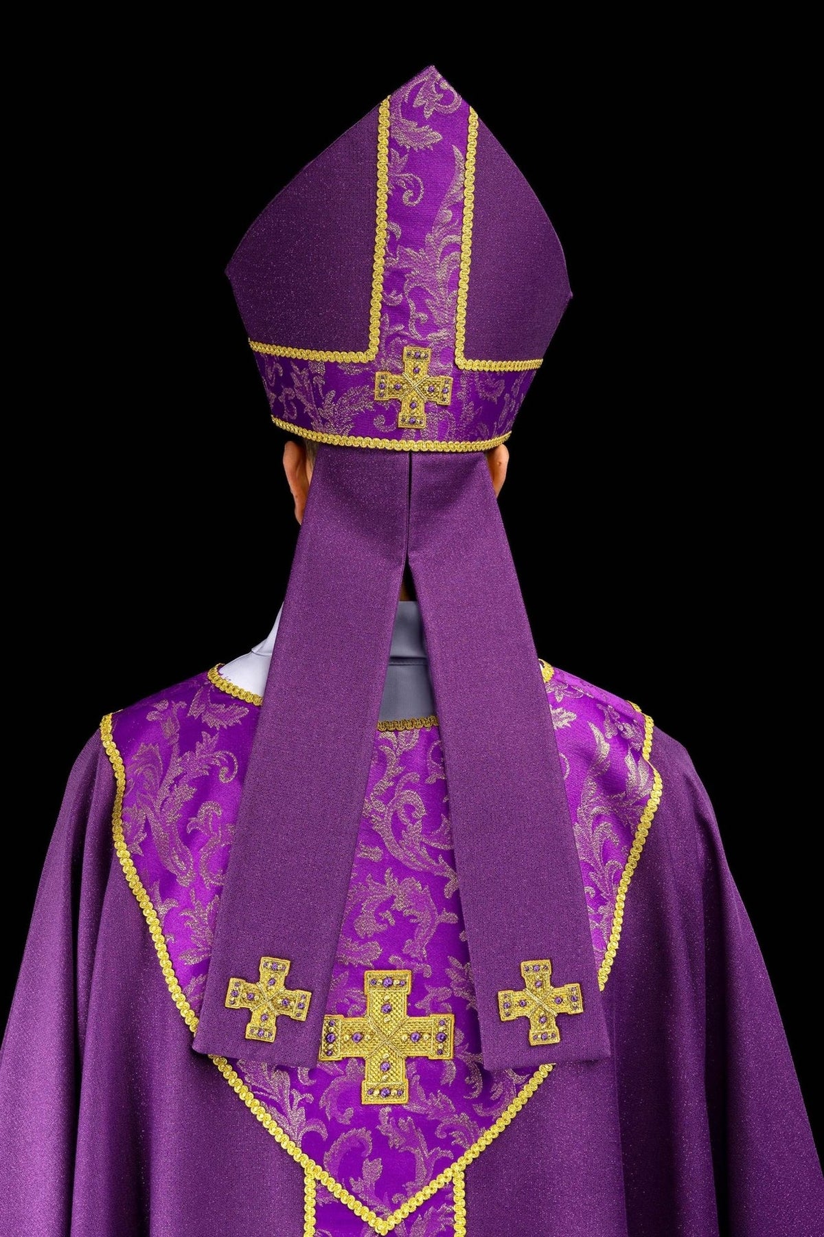 Purple miter, back view with gold crosses and jacquard panels