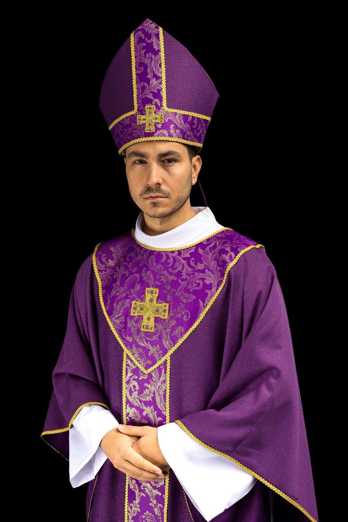 Purple miter detail with gold cross embroidery and purple fabric