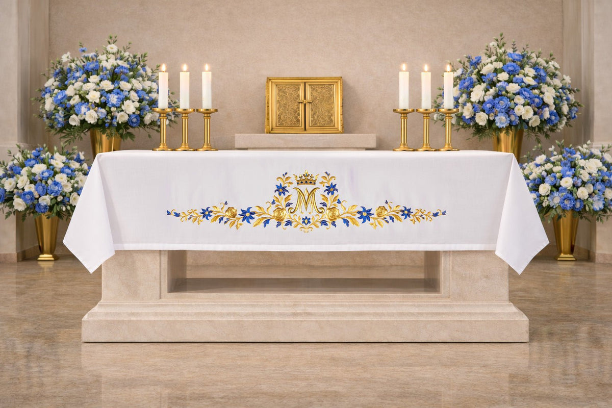 Altar cloth front view with centered crowned Marian symbol and floral embroidery