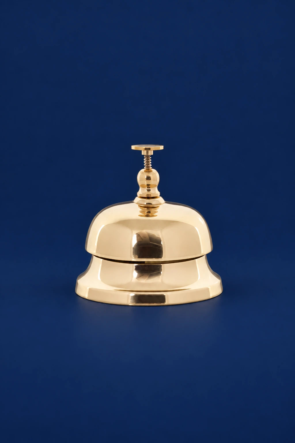 Brass Altar Bell, 3.75 in (9.5 cm) High, front view with polished brass finish and raised handle