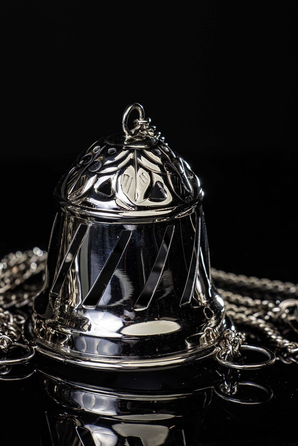 Santiago de Compostela thurible close-up of embossed floral lid and hanging ring