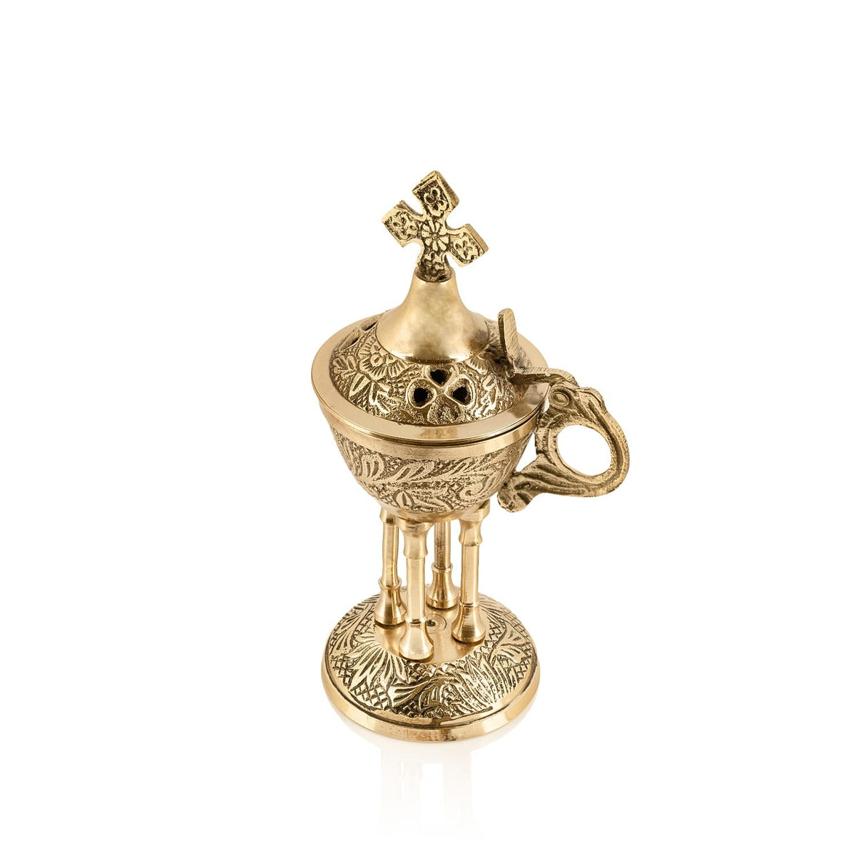 Brass censer with cross-topped lid, angled view showing handle and engraved bowl