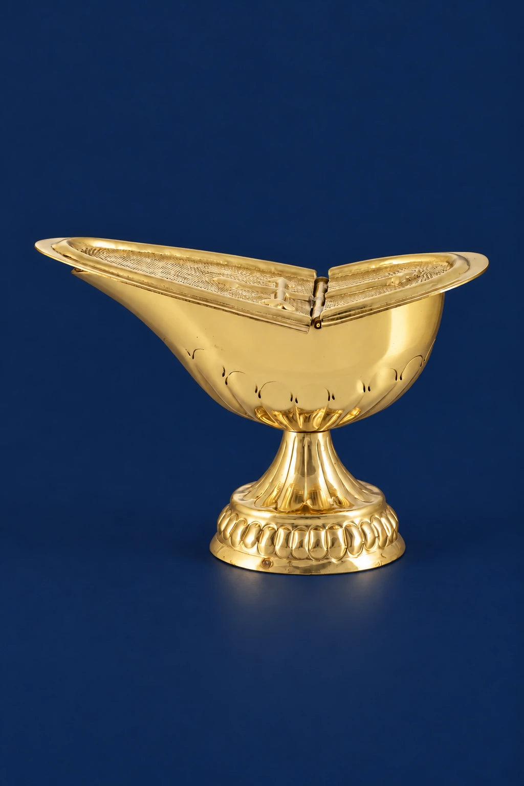 Polished brass incense boat with open lid, shown front view on pedestal base