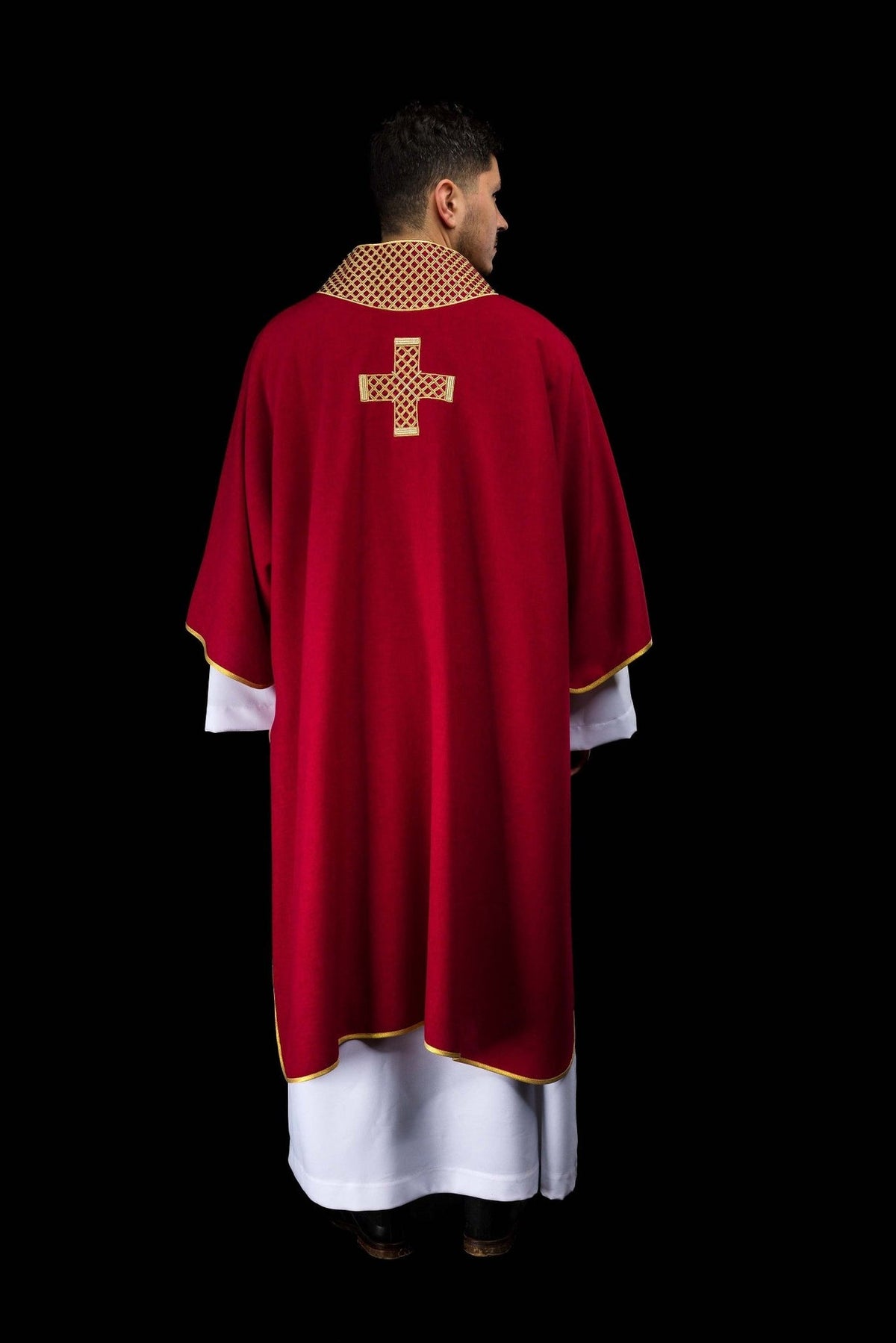 Red dalmatic back view with gold cross and collar