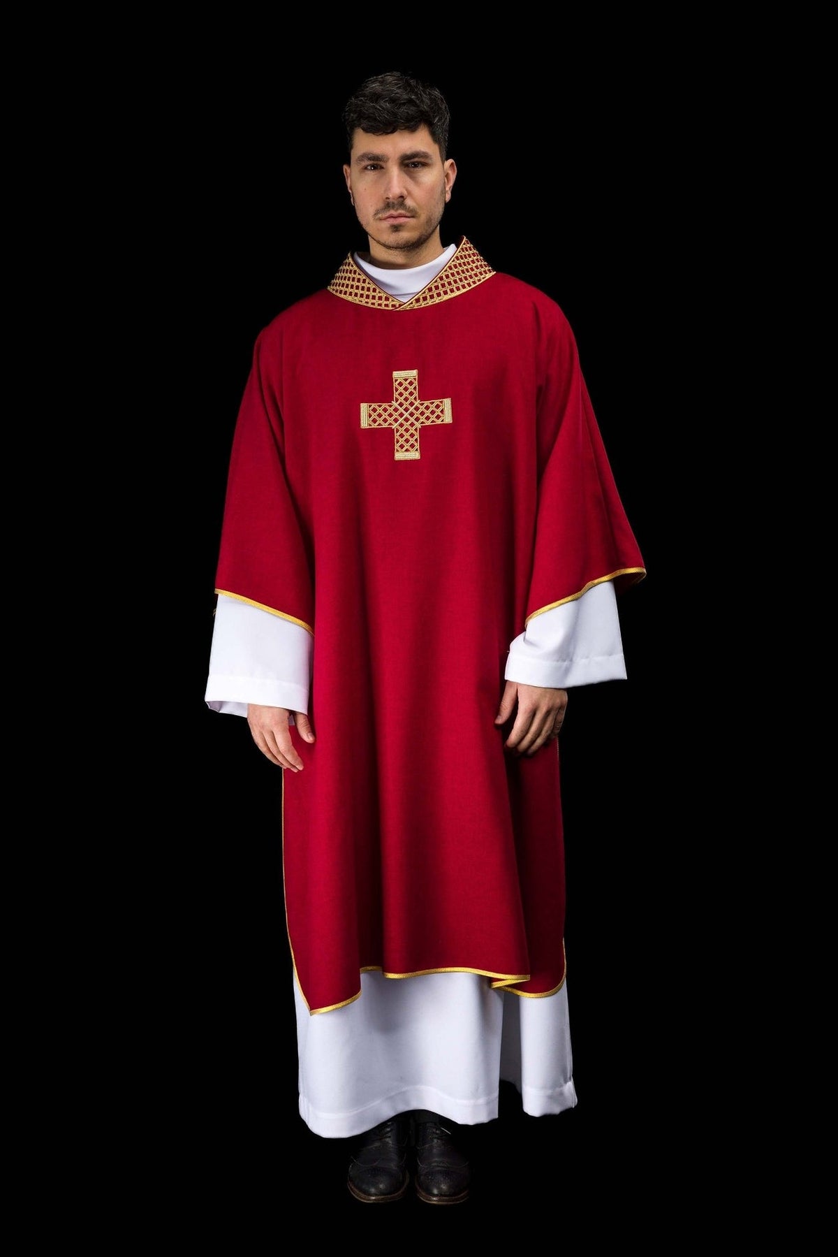 Red dalmatic worn from the front with an embroidered gold cross, gold trim and embroidered collar