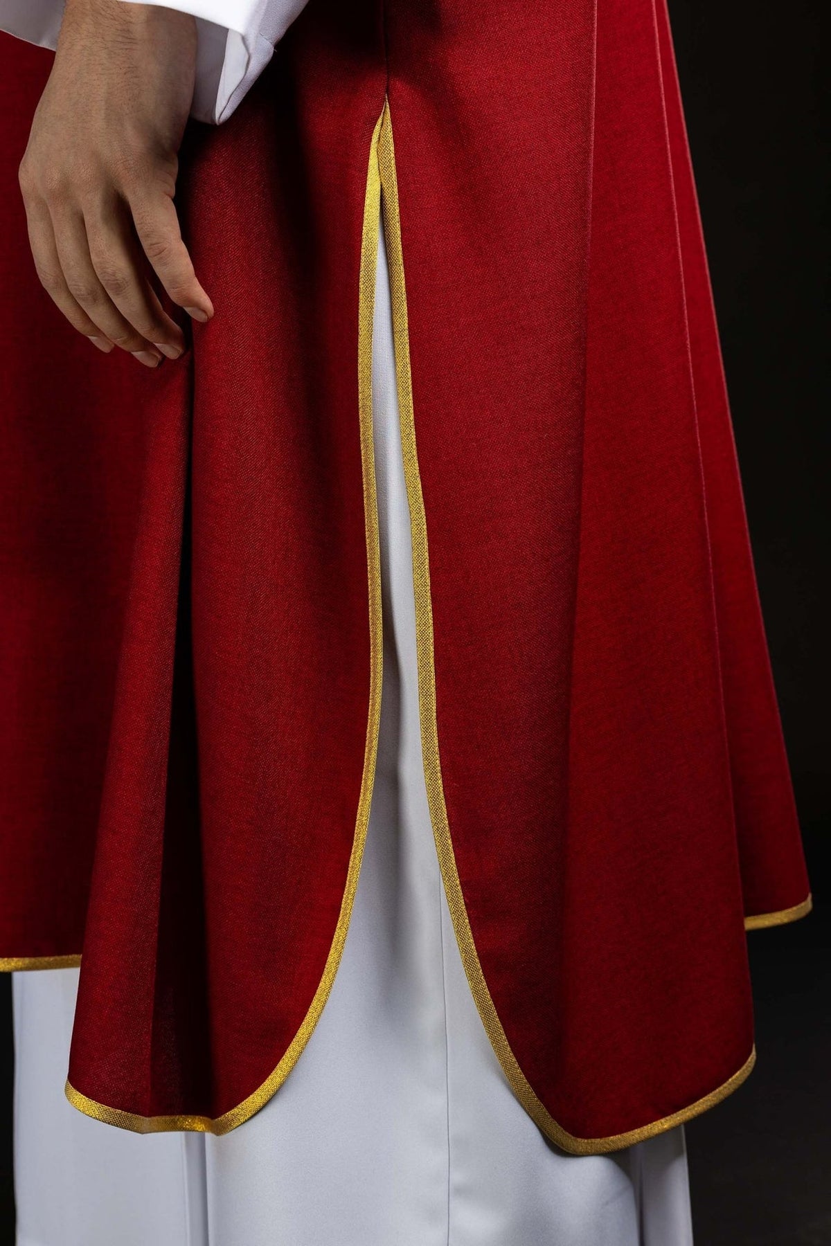 Red dalmatic side opening with gold edging