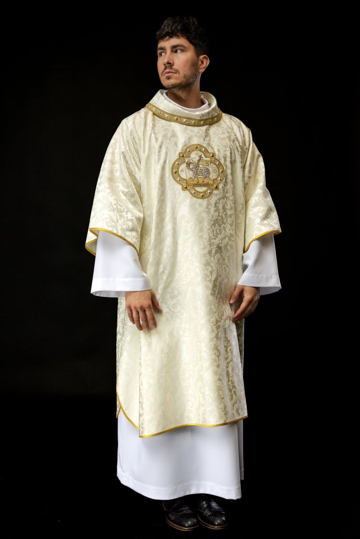 Ecru dalmatic front view with Paschal Lamb embroidery and gold trim
