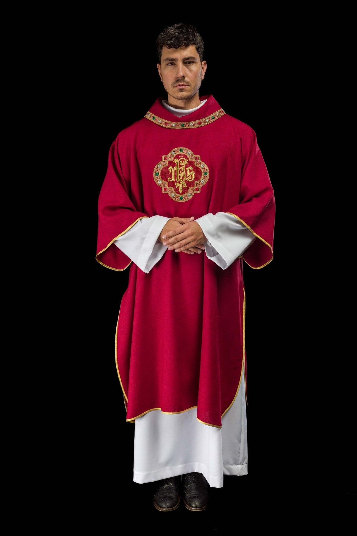 Red dalmatic front worn view with gold trim, red collar and embroidered IHS symbol