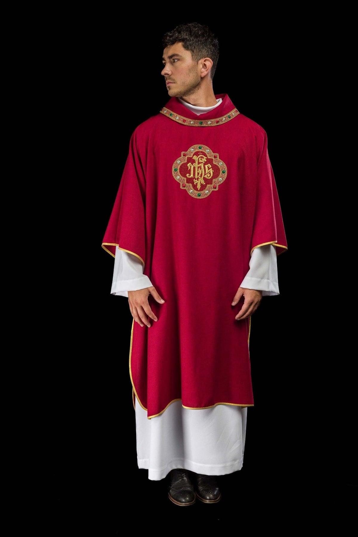 Red dalmatic full front view with embroidered IHS symbol, red collar and gold trim