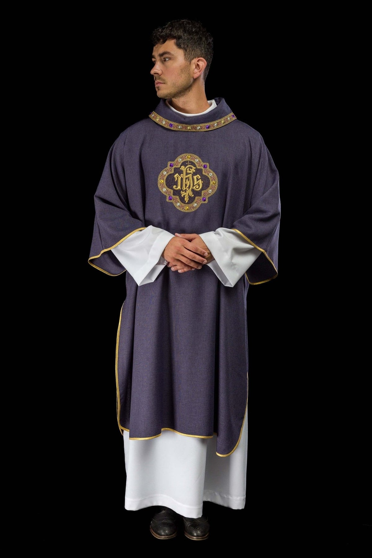 Purple dalmatic front view with embroidered IHS symbol and gold trim