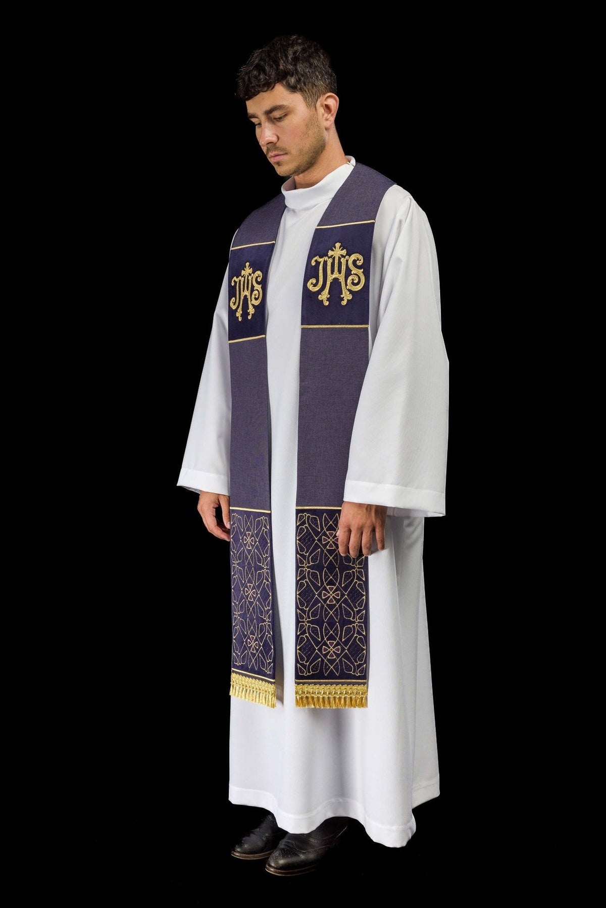 Purple velvet stole worn in a three-quarter front view with IHS embroidery and patterned ends