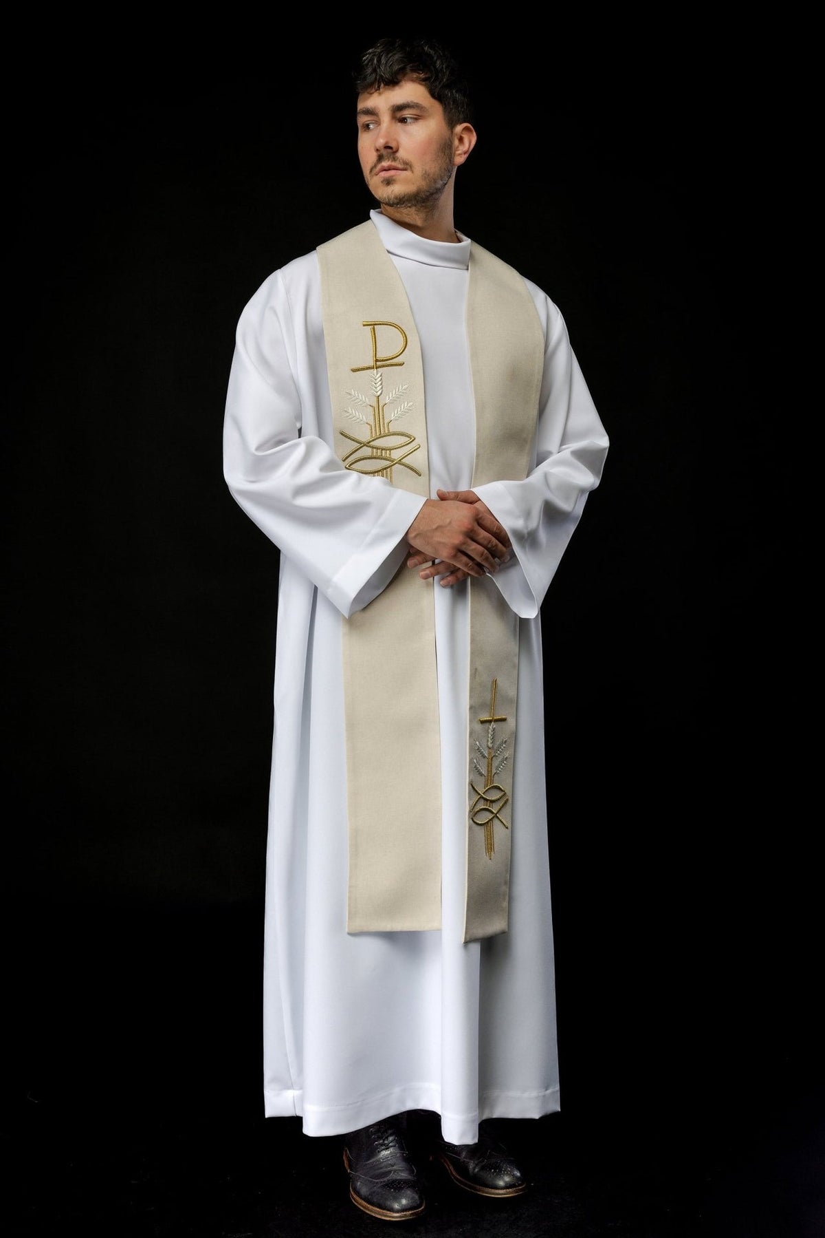 Ecru stole worn at an angle with front Pax, fish, and wheat embroidery