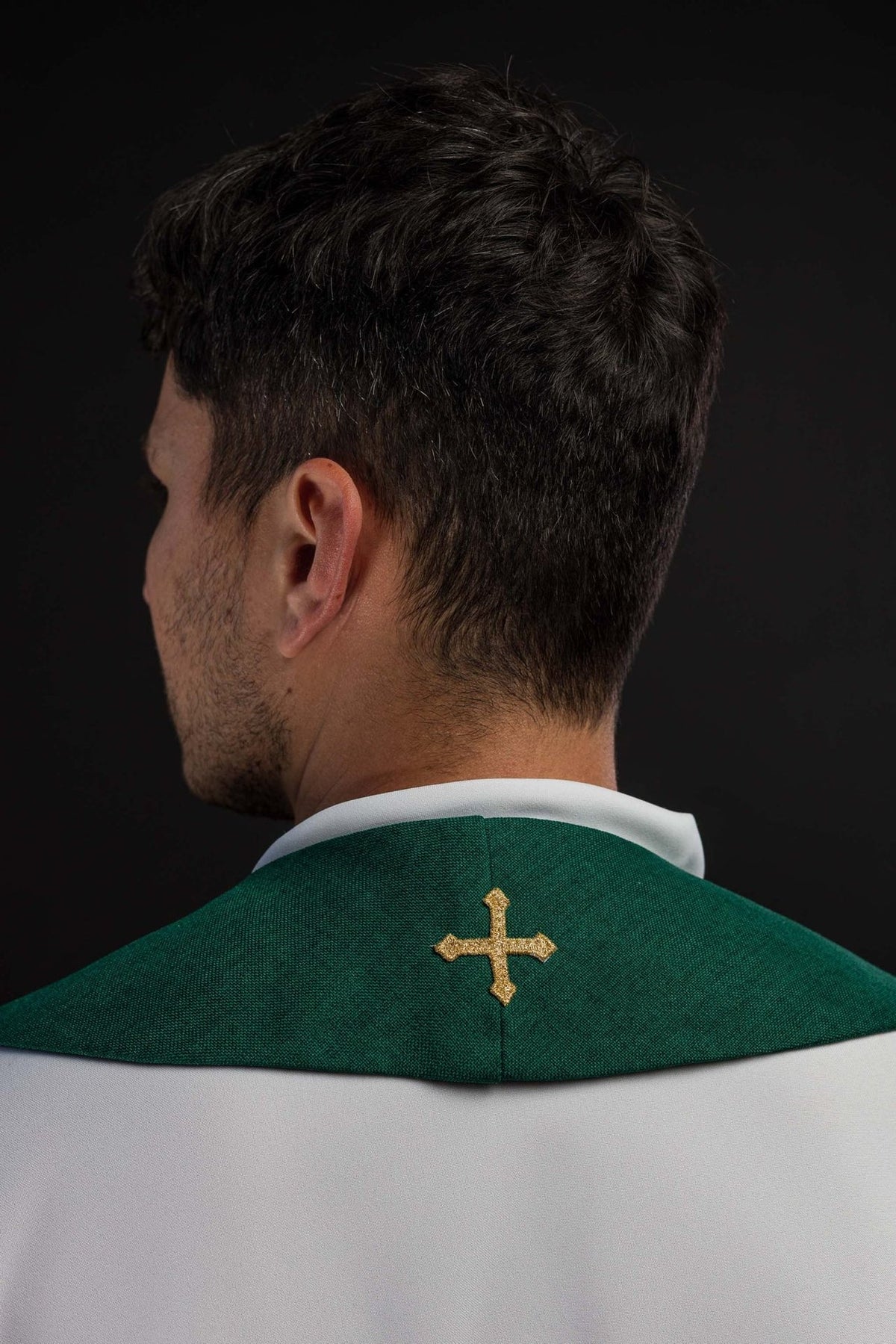 Green stole back view with embroidered gold cross