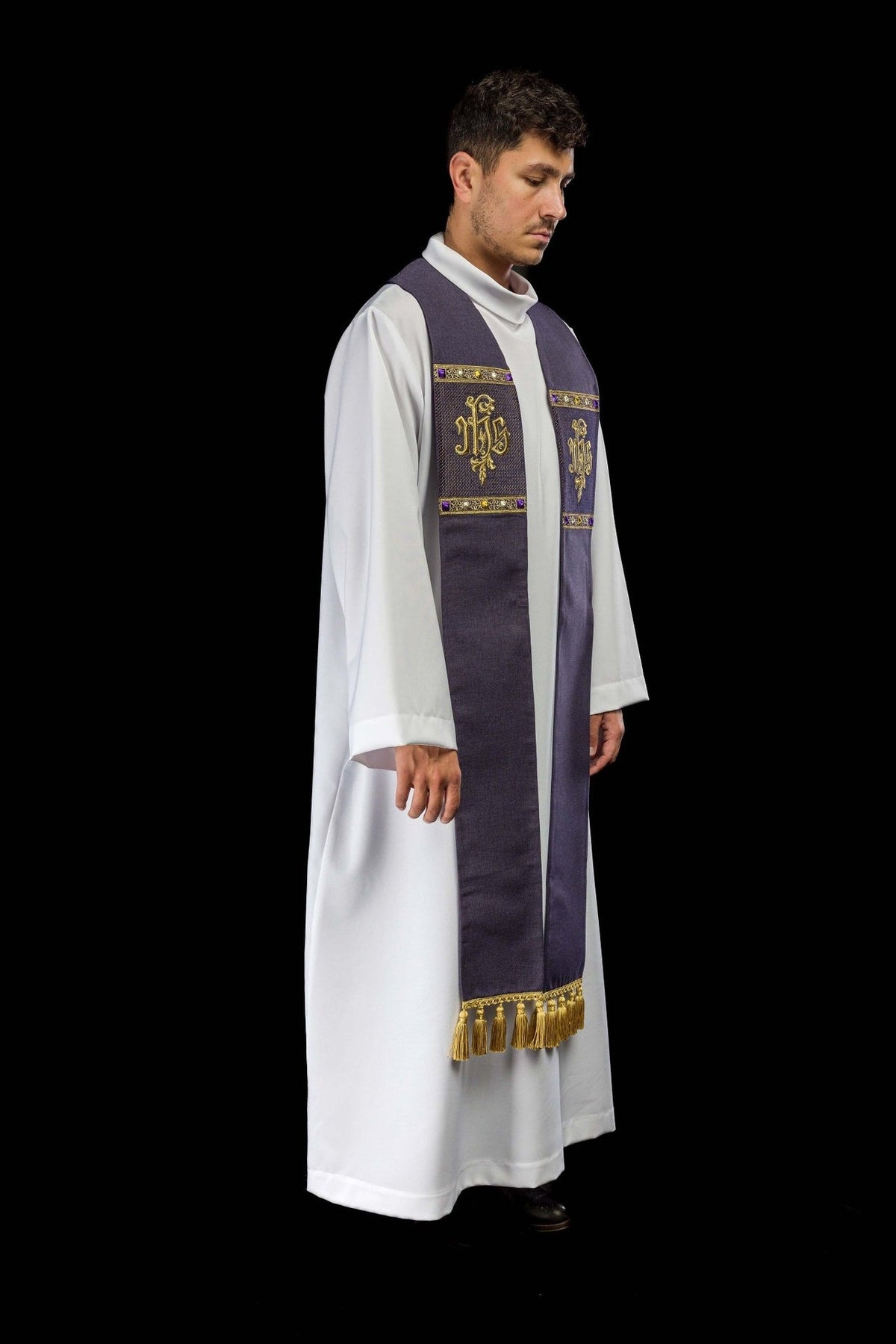 Purple stole side view worn with IHS embroidery and gold tassel trim