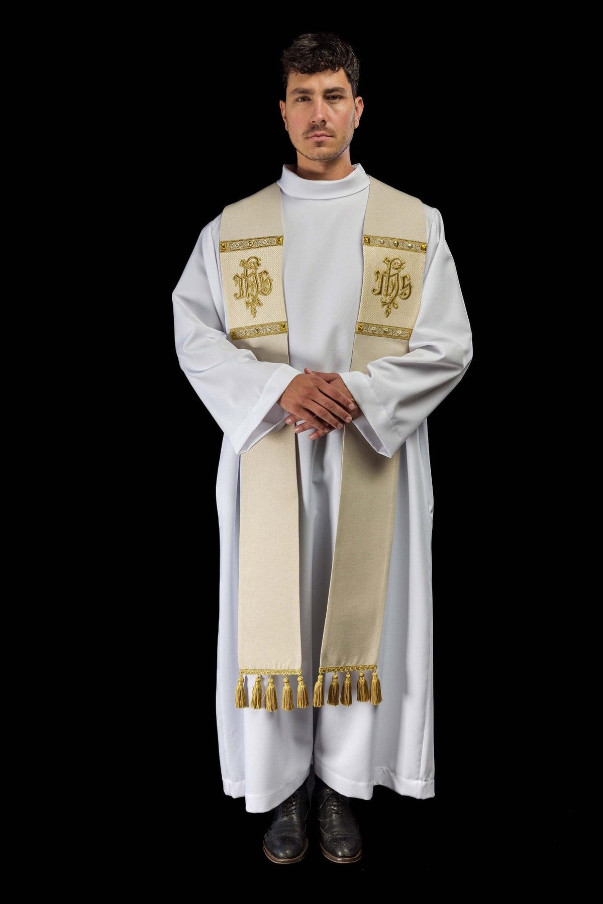 Ecru stole full front view with gold IHS embroidery, borders and tassels