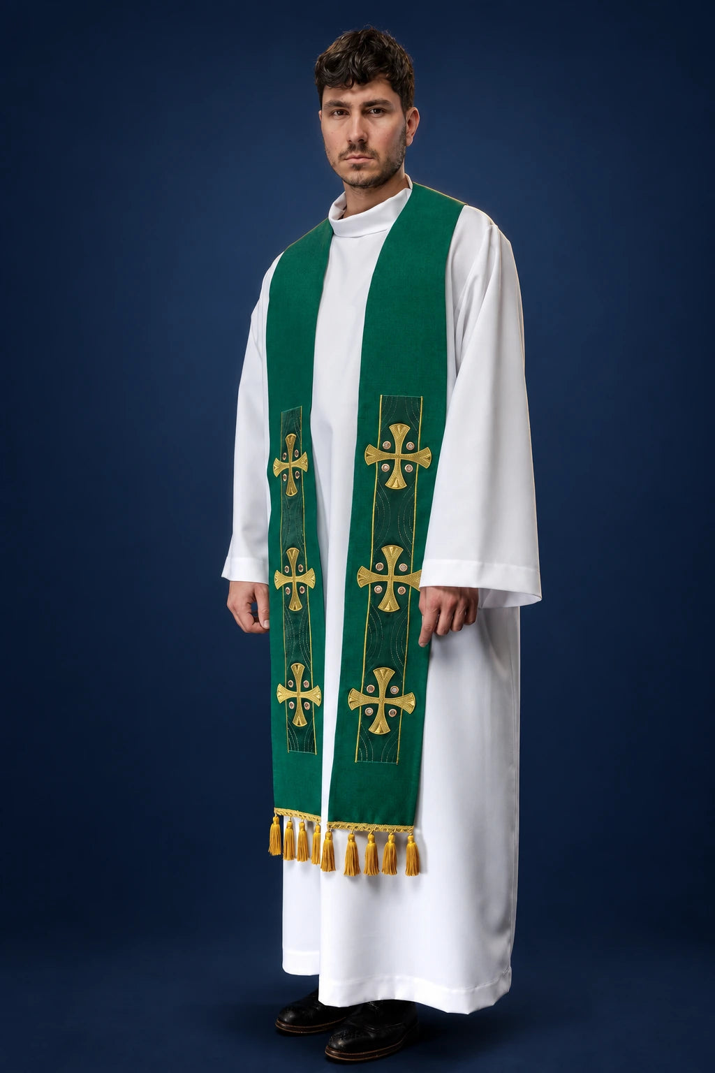 Green Embroidered Stole with Crosses worn front view, showing gold cross embroidery and tassel trim