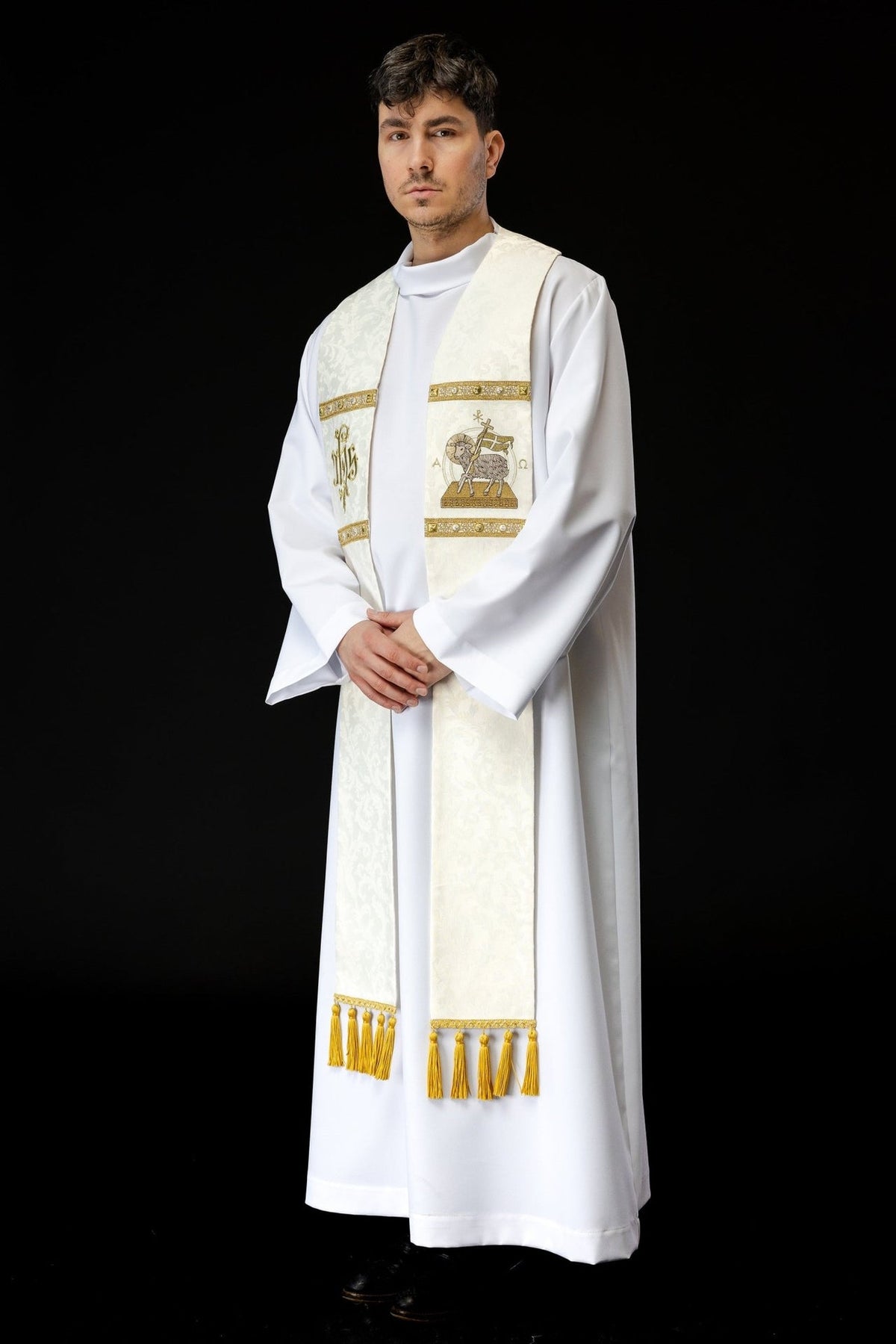 Stole detail with gold cross embroidery on ecru jacquard fabric