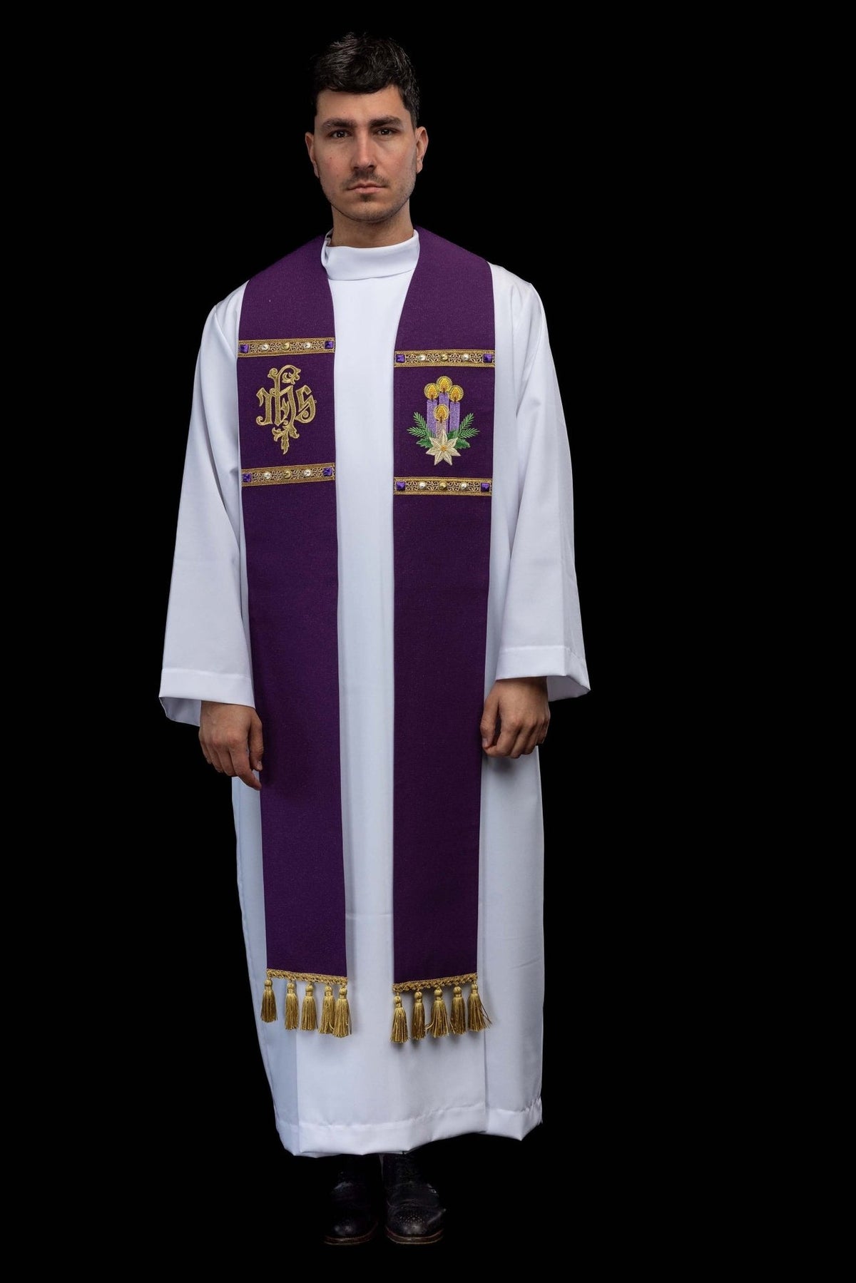 Advent stole worn full length, purple with embroidered motifs, gold trim and tassels