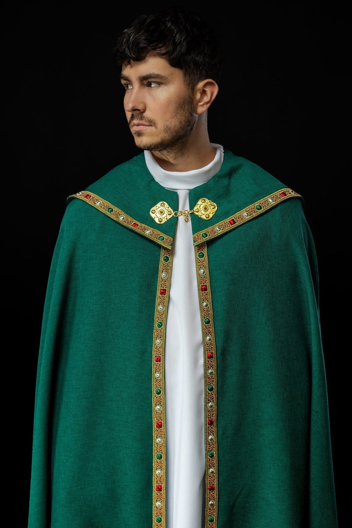 Green cope front view with white collar and patterned gold trim