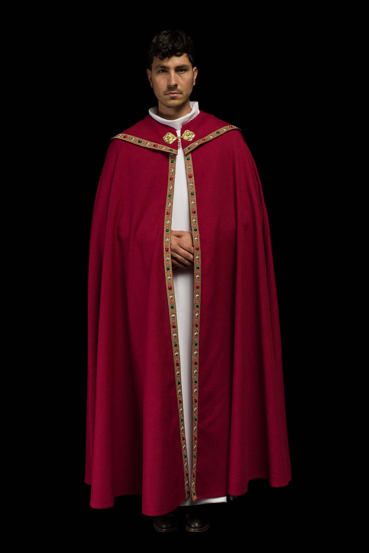 Red cope, full front view with gold trim and clasp