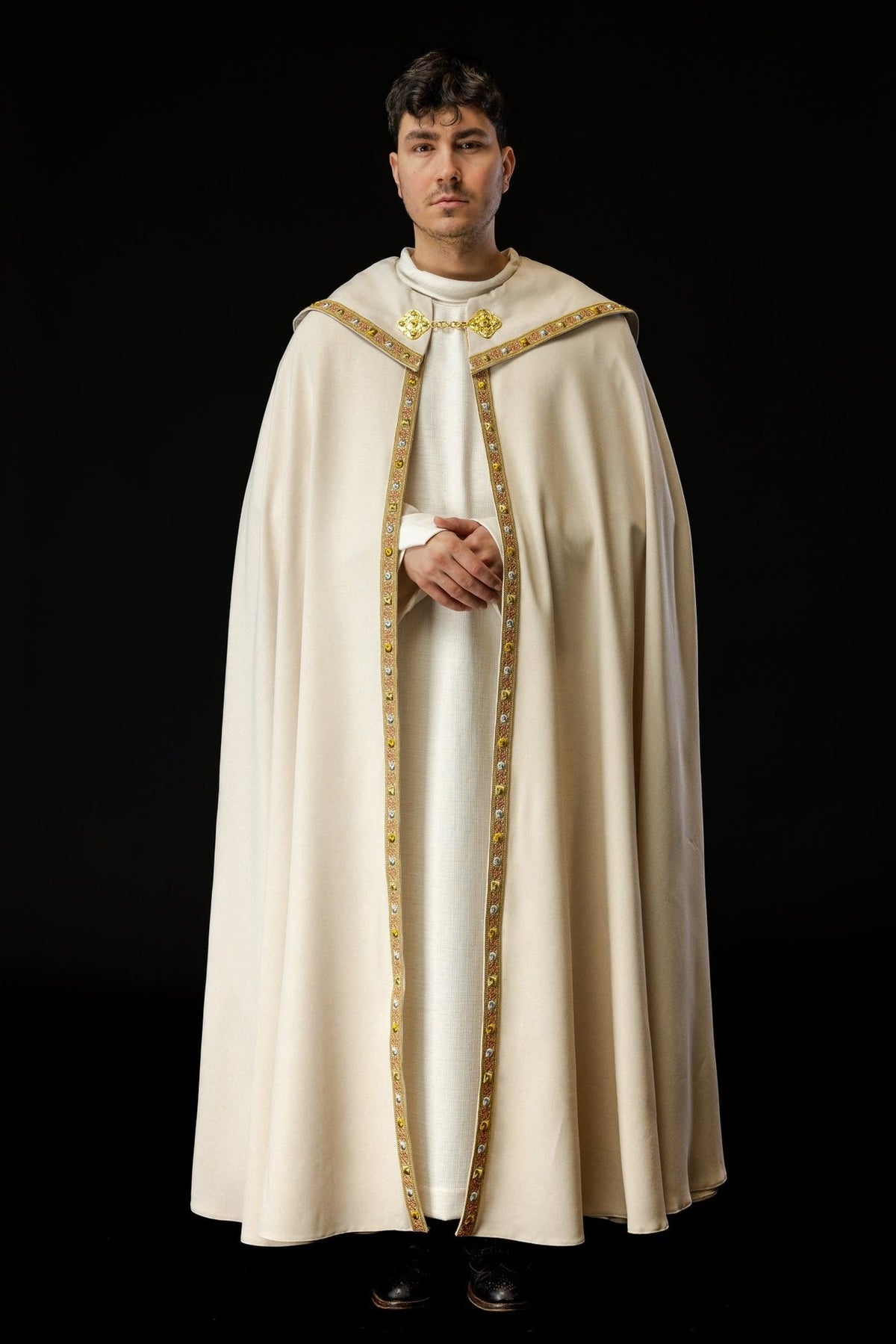 Ecru cope front view with gold trim, inner stole and clasp