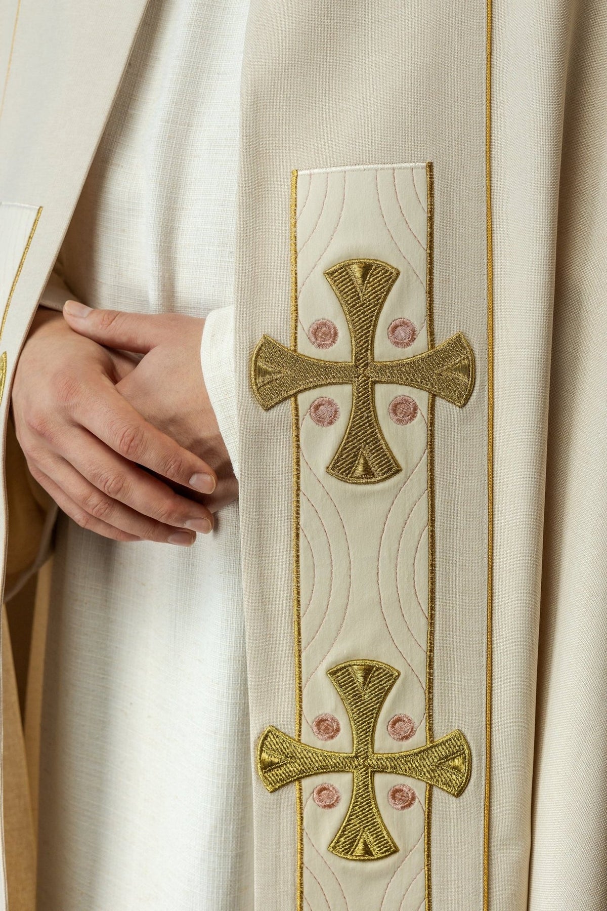 Ecru velvet cope, close-up of front embroidered gold crosses