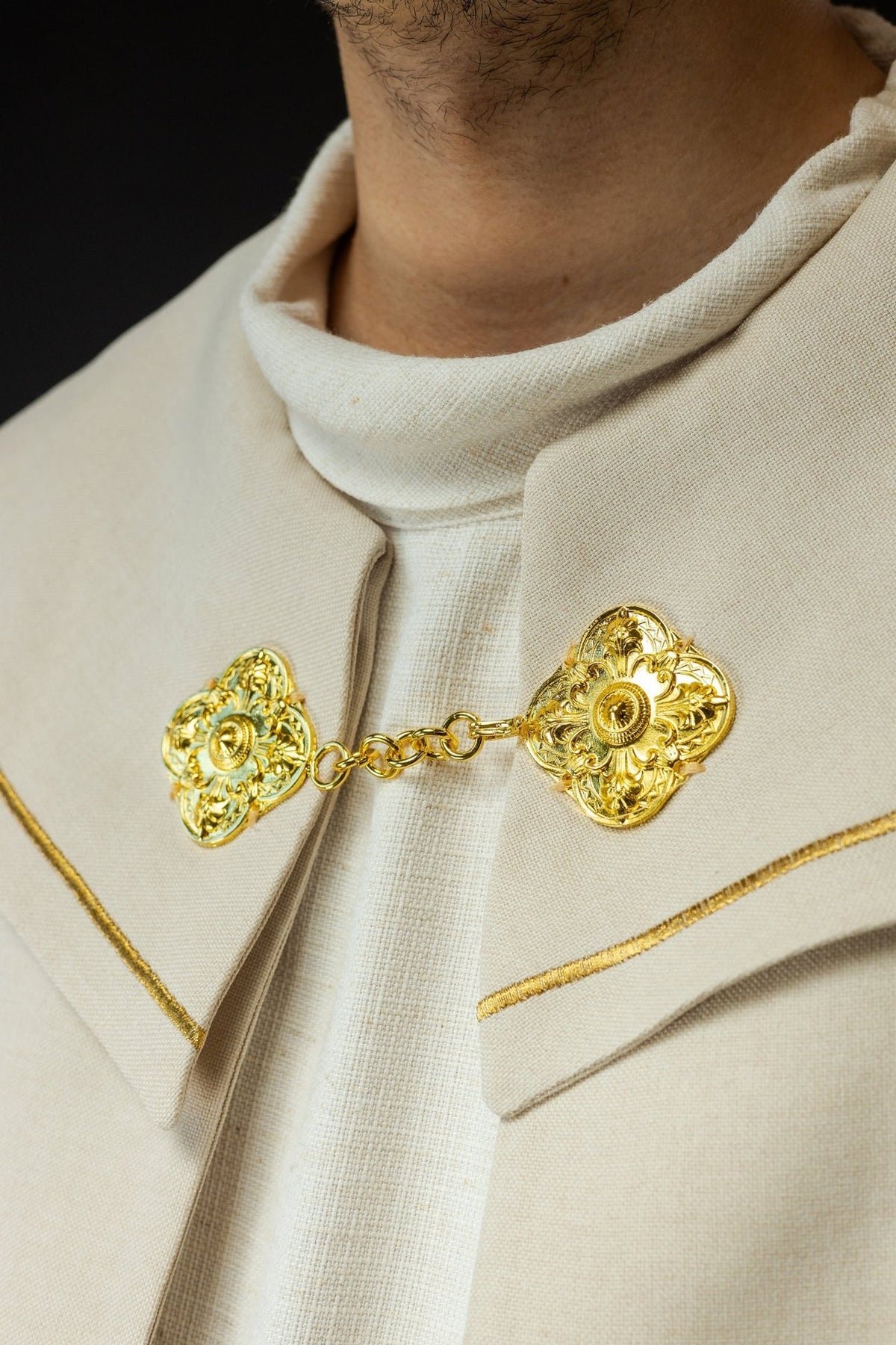 Ecru velvet cope, close-up of collar clasp and gold trim