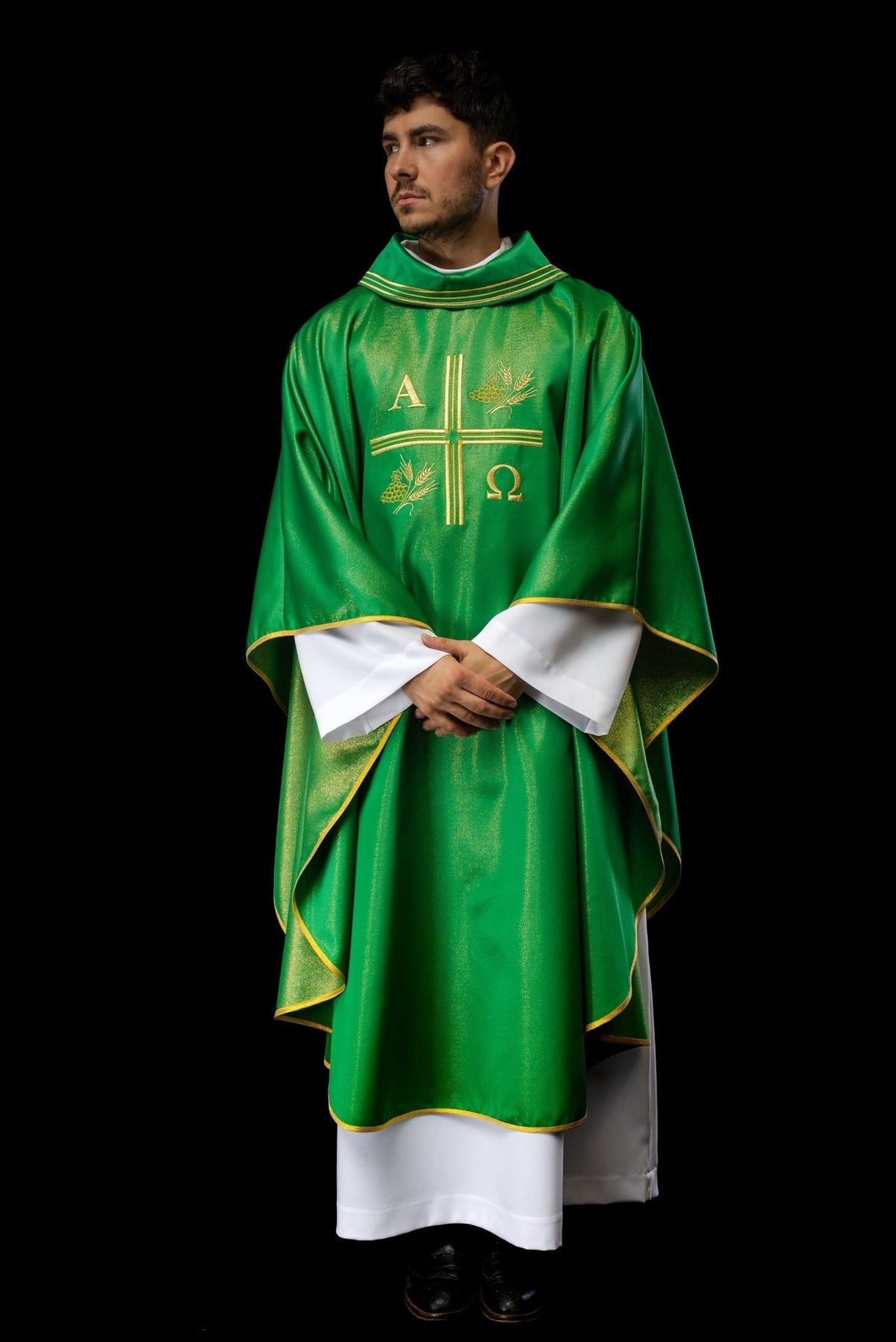 Green chasuble full back view with gold trim and embroidery