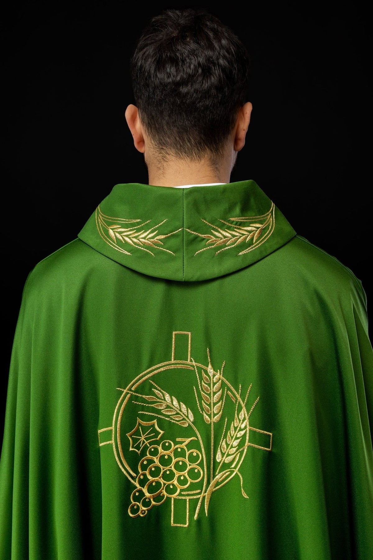Green chasuble back close-up with gold wheat embroidery on the collar