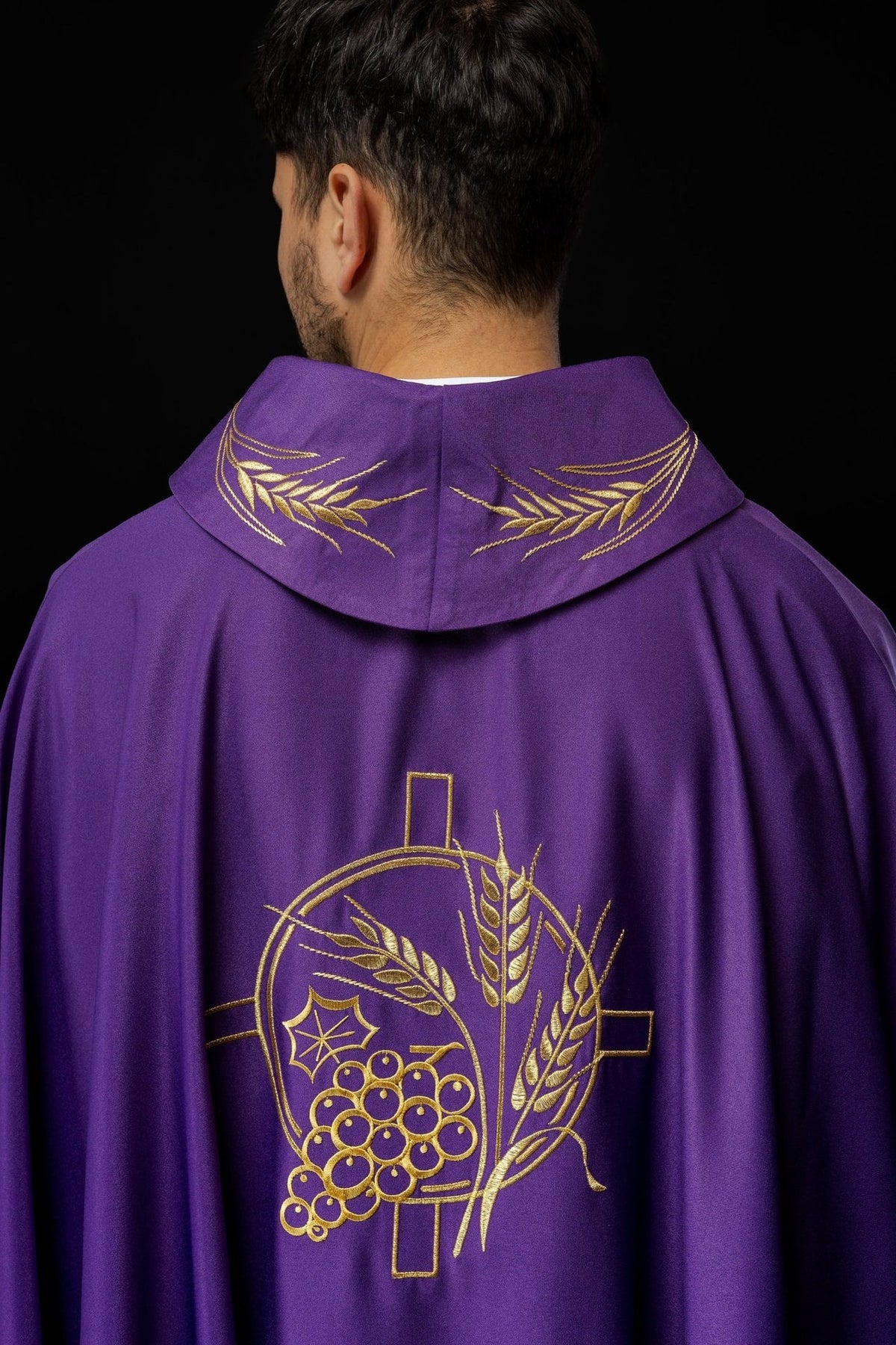 Purple chasuble back close-up with gold wheat embroidery on collar