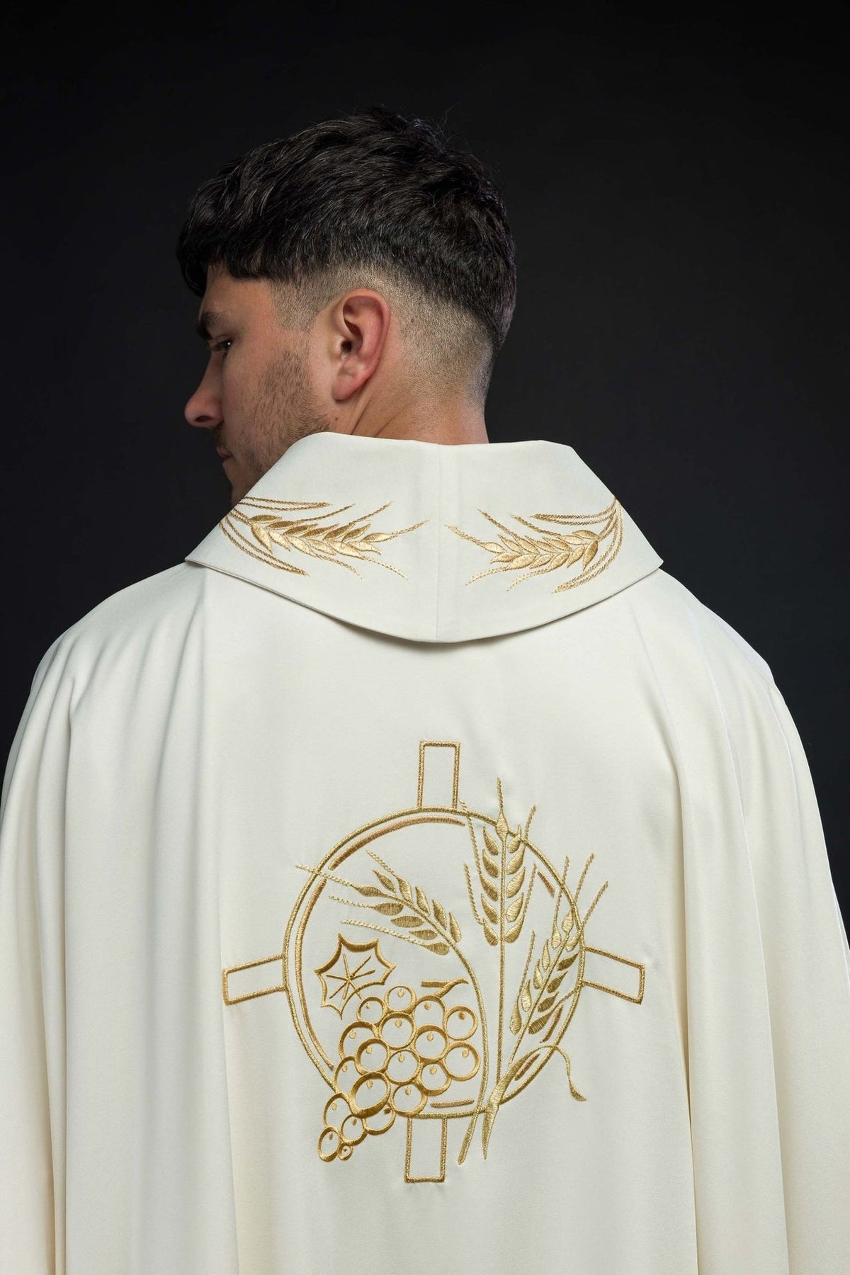 Ecru chasuble close-up showing embroidered gold wheat on the collar