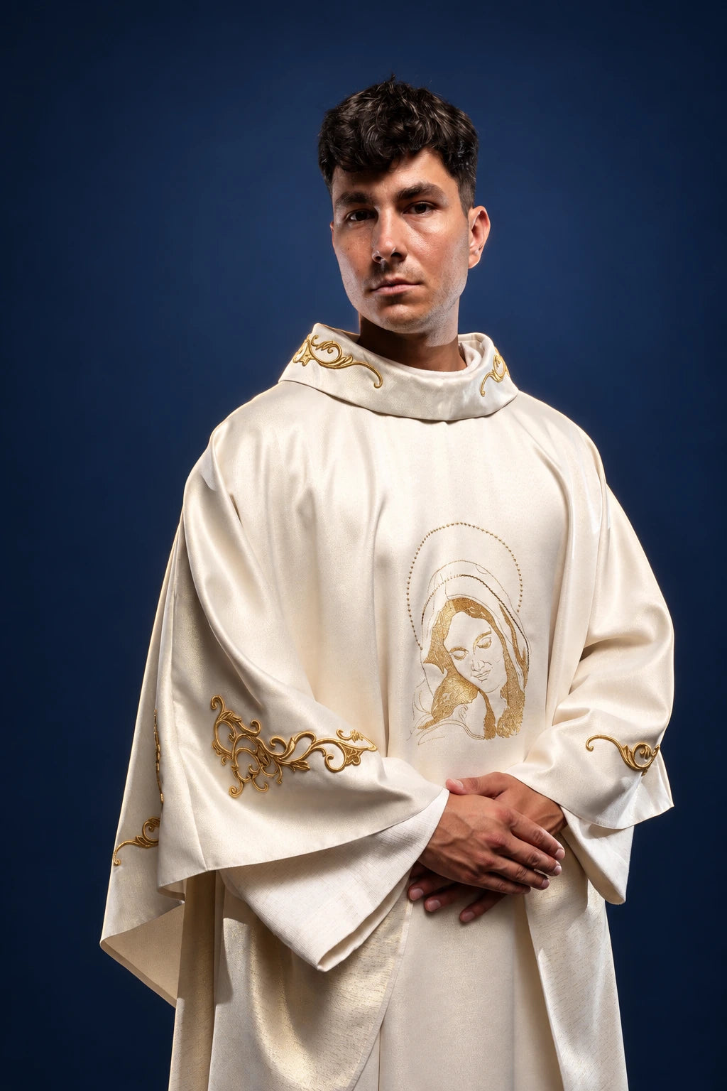Liturgical Chasuble with an Image of Our Lady Embracing Jesus, front view in ivory with gold embroidery