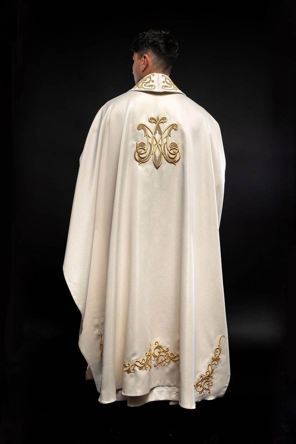 Liturgical chasuble full back view with gold Marian monogram and hem embroidery