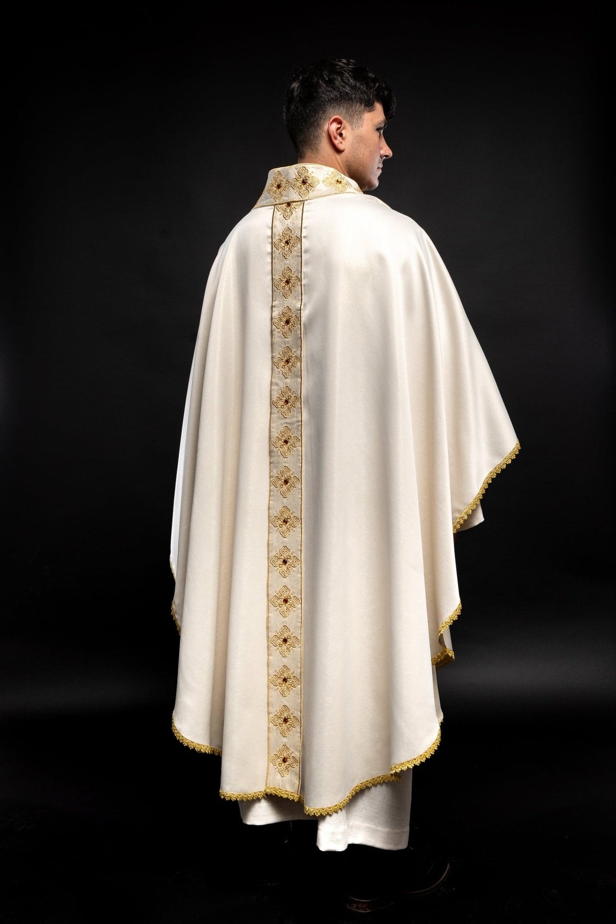 Ecru chasuble back view with gold embroidered orphrey and trim