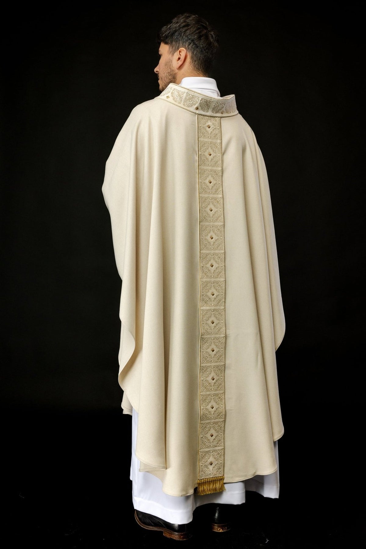 Ecru chasuble back view with gold embroidered orphrey