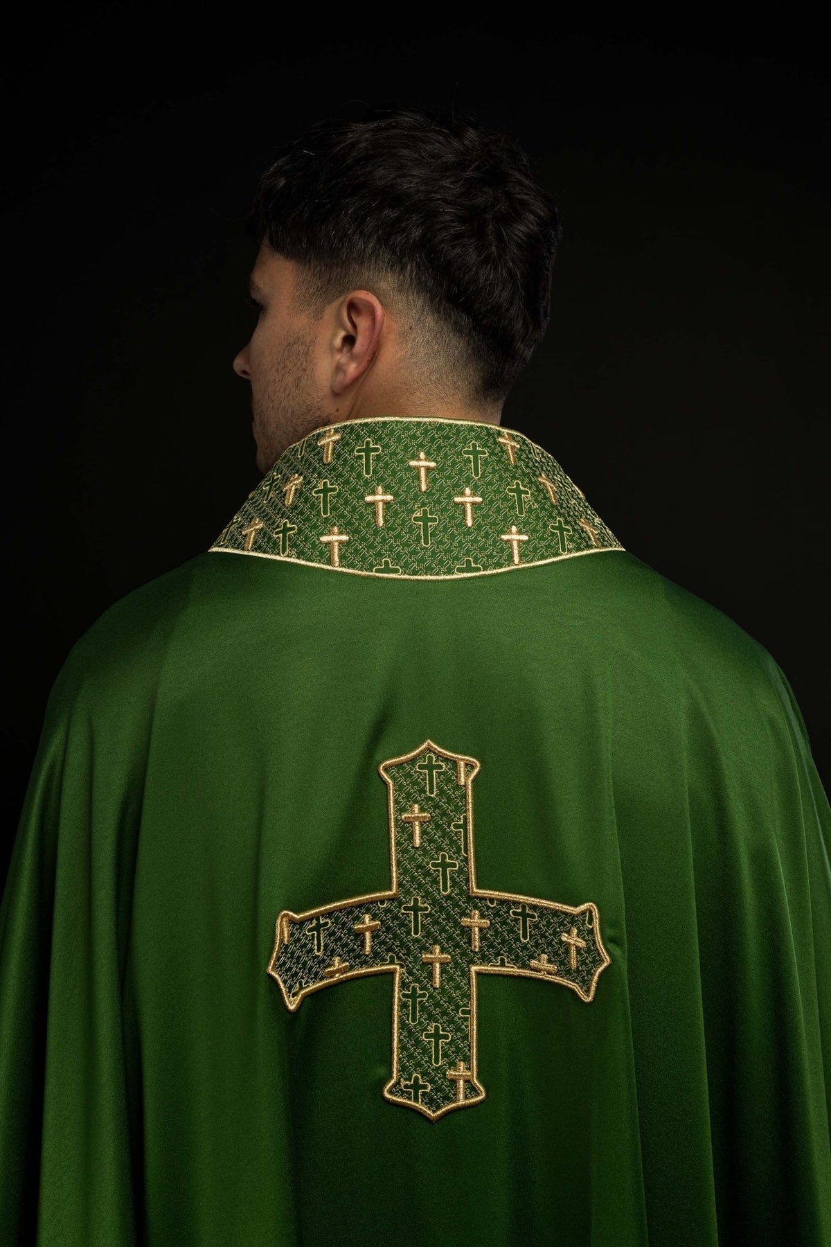 Green chasuble back view with embroidered cross and green collar