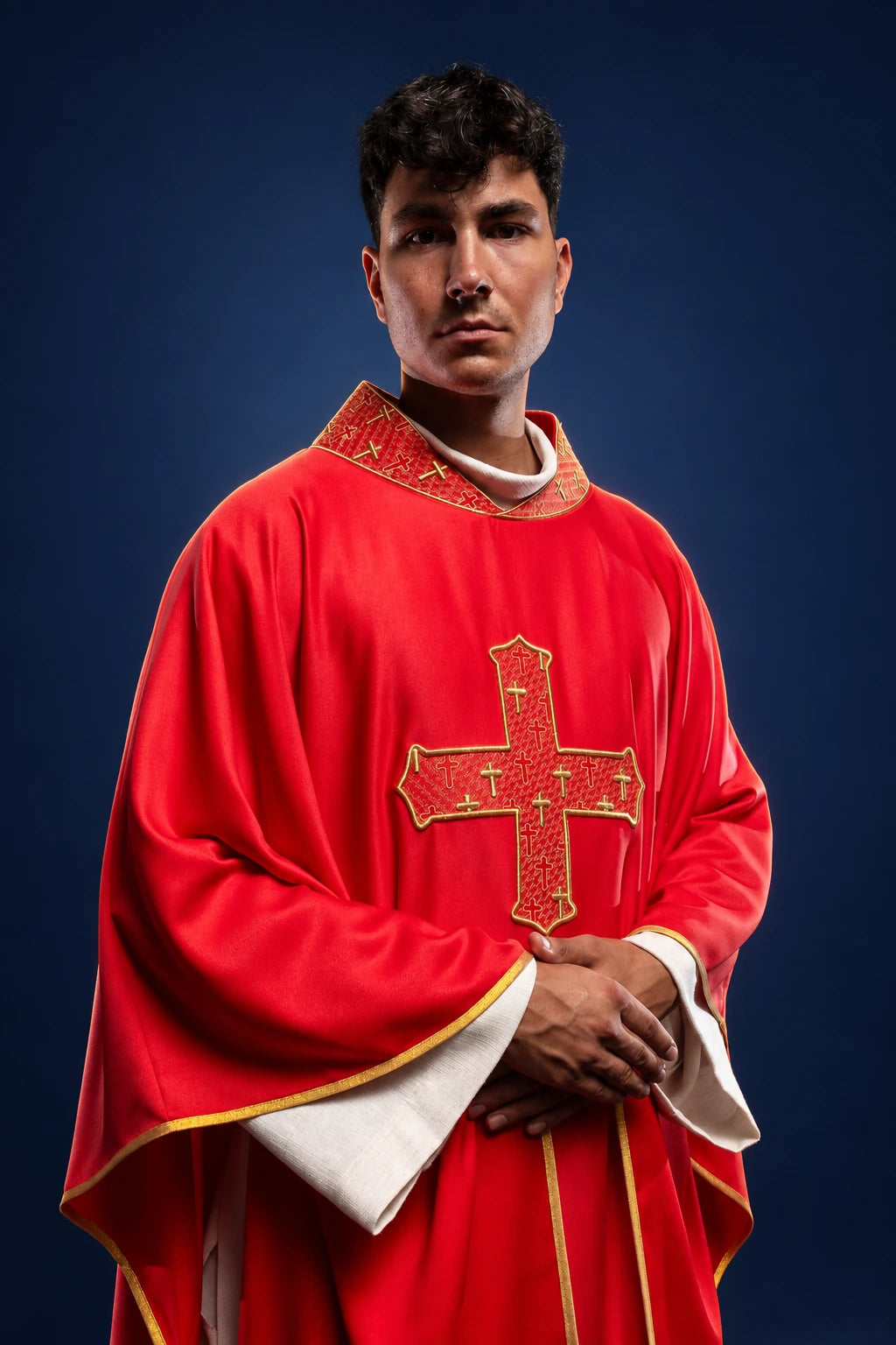 Chasuble with Richly Embroidered Cross and Red Collar, front view worn in red with gold embroidery
