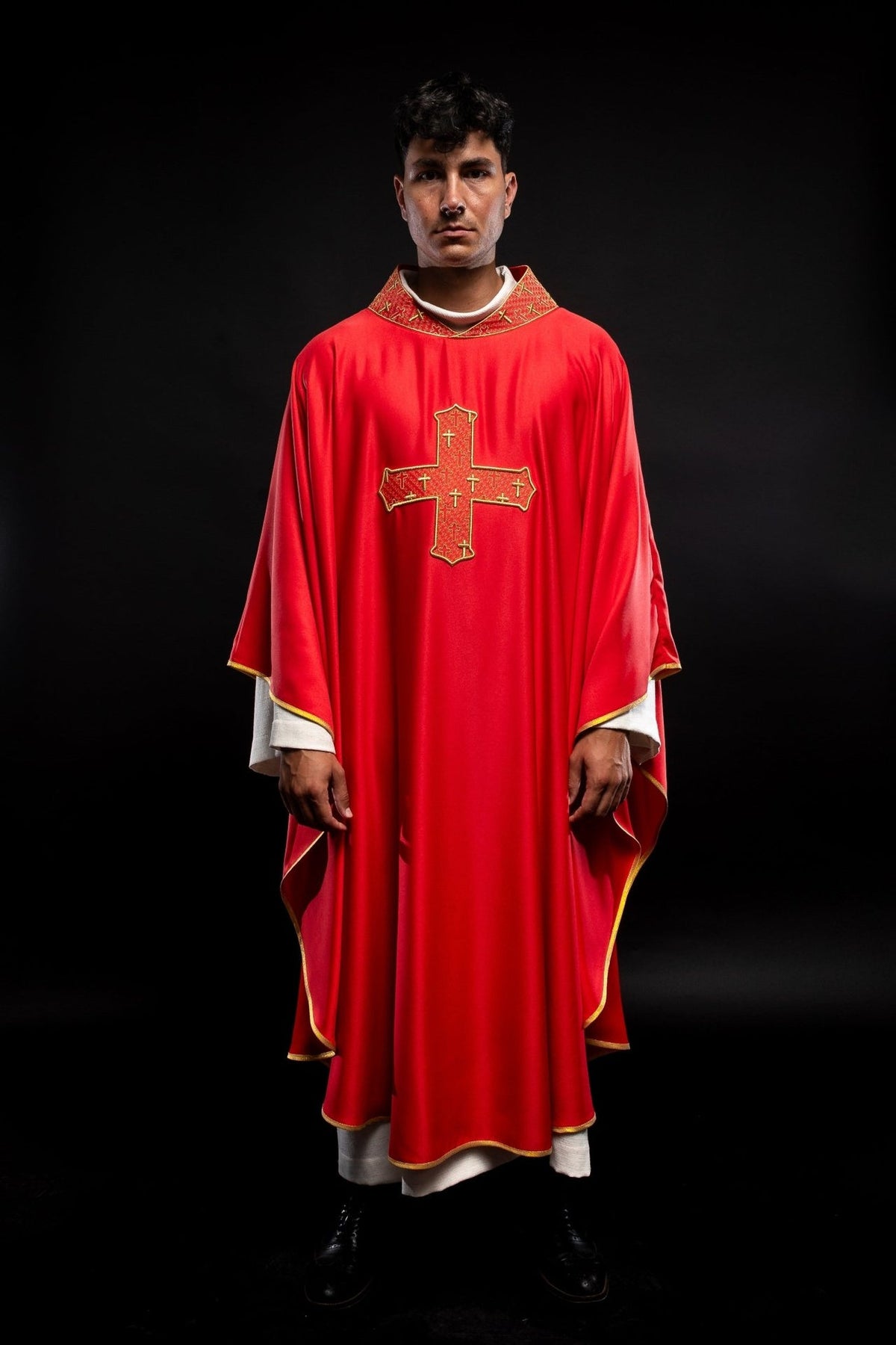 Red chasuble front view with embroidered cross and gold-trimmed collar