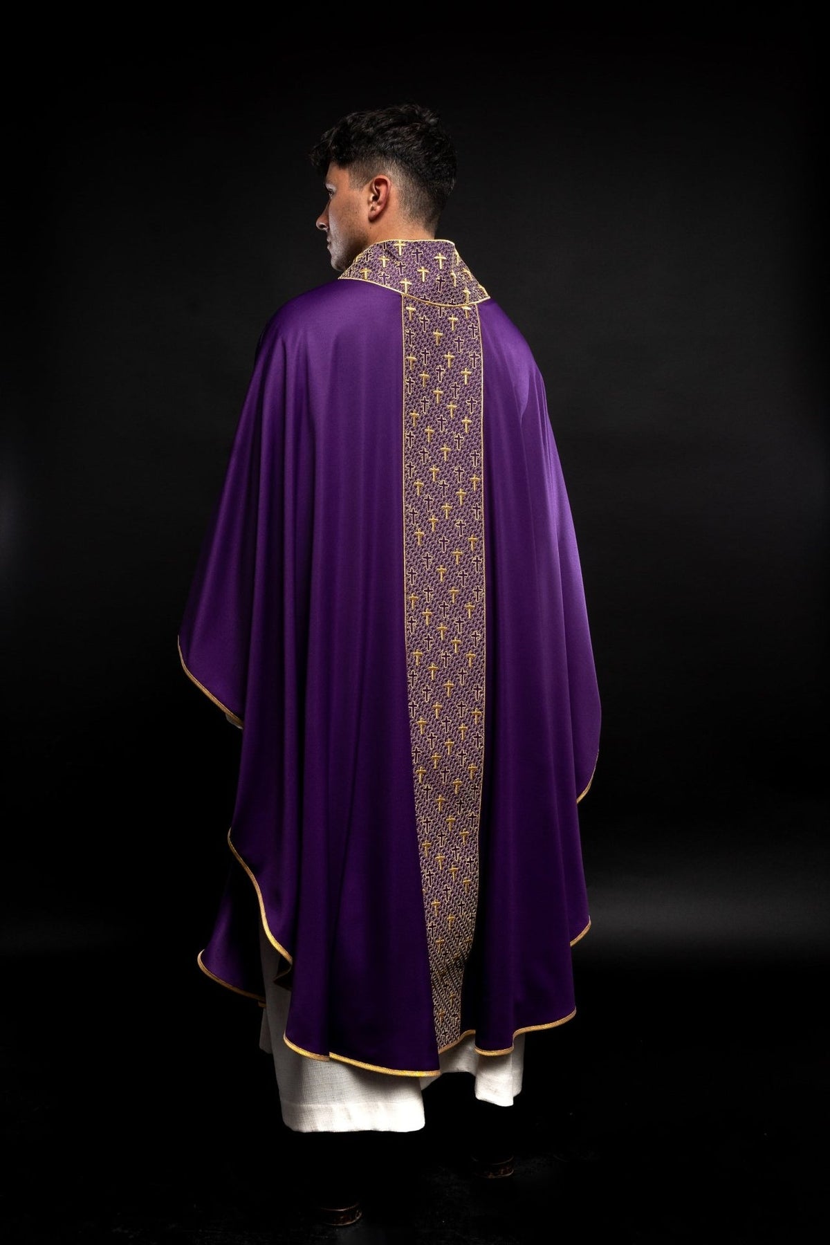 Purple chasuble back view with embroidered orphrey and crosses