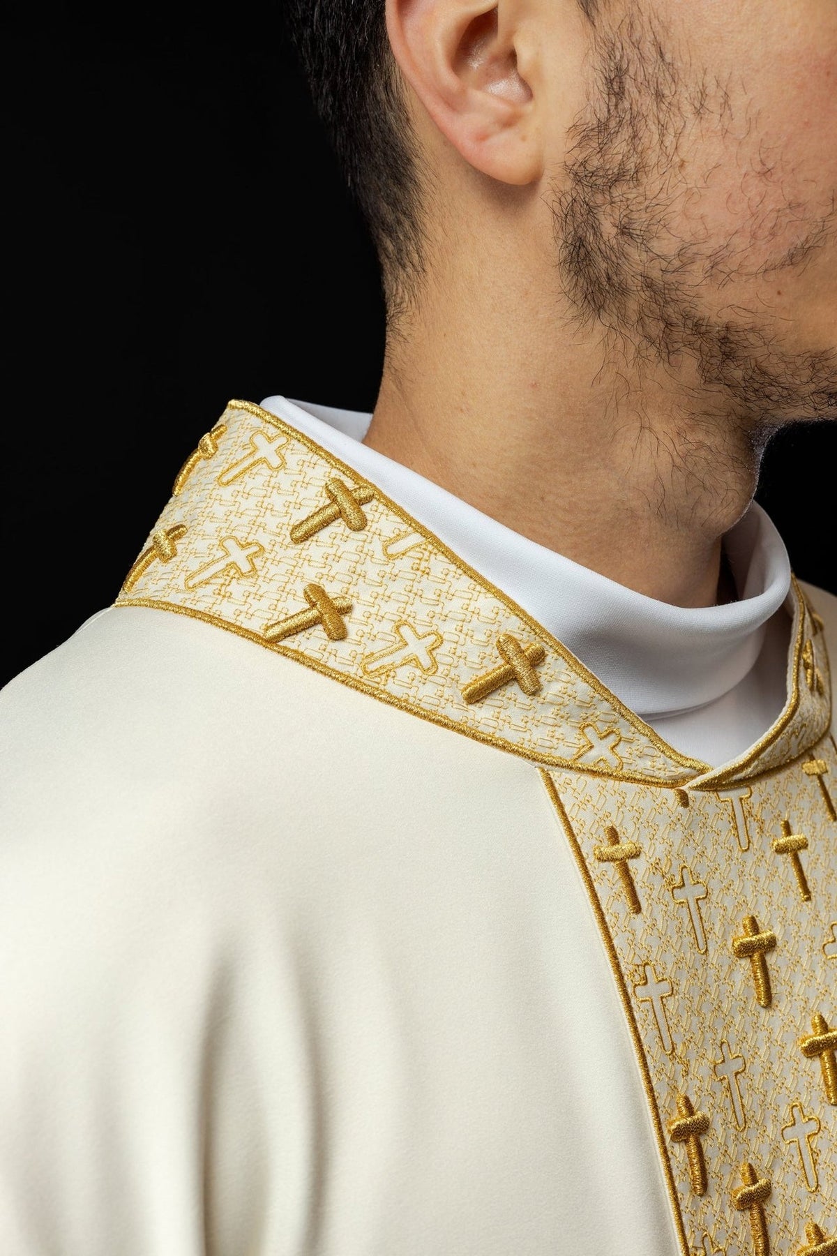 Ecru chasuble, close-up of gold cross embroidery on the collar