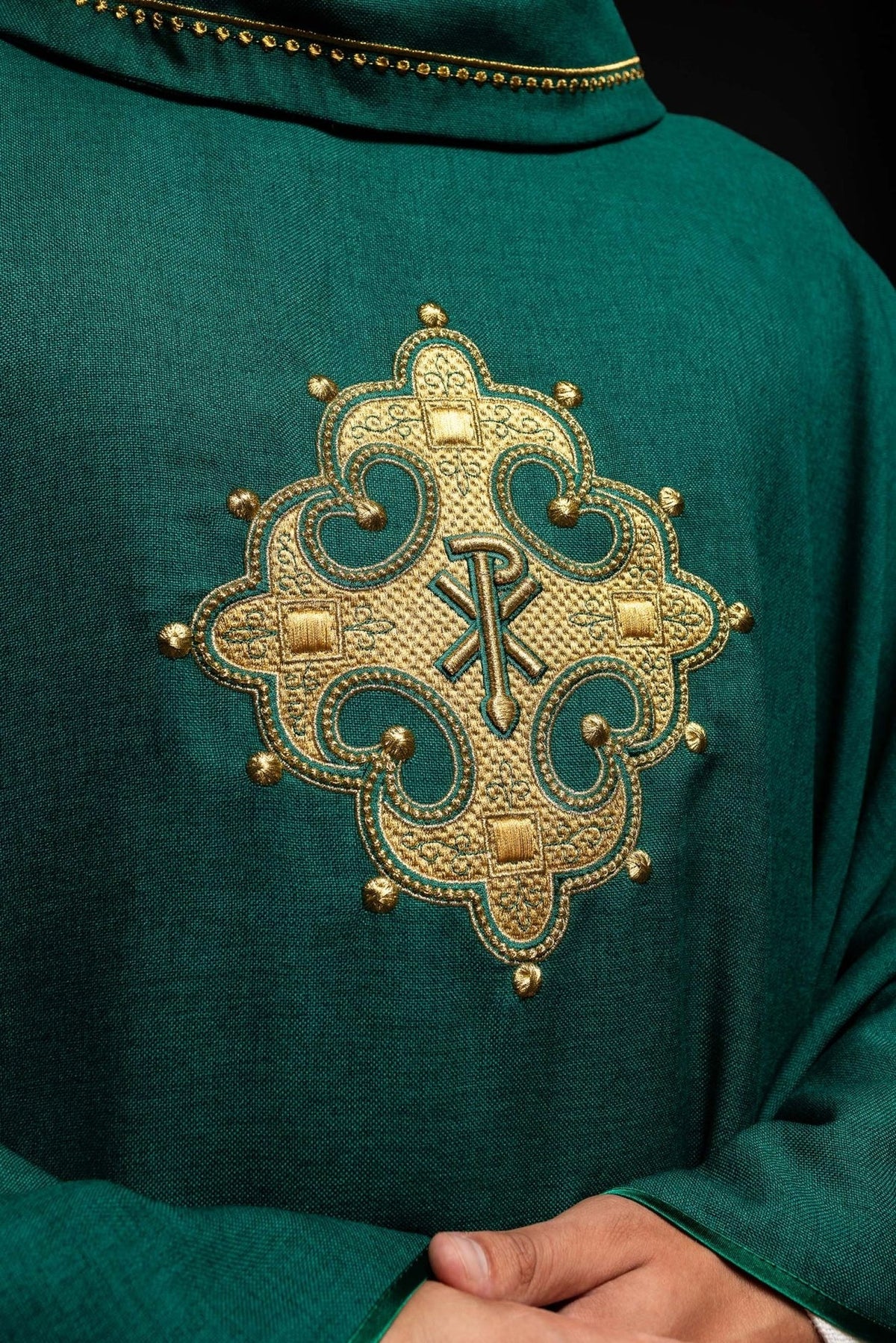 Green chasuble close-up of gold embroidery and collar trim