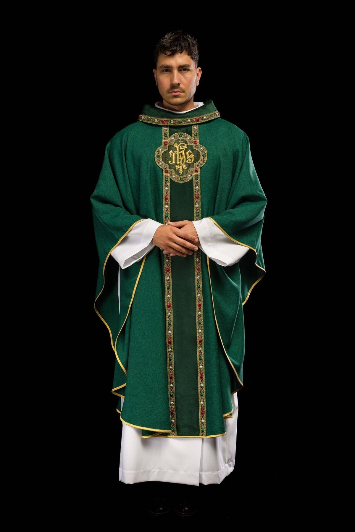 Green chasuble front view showing gold-edged sleeves and IHS orphrey