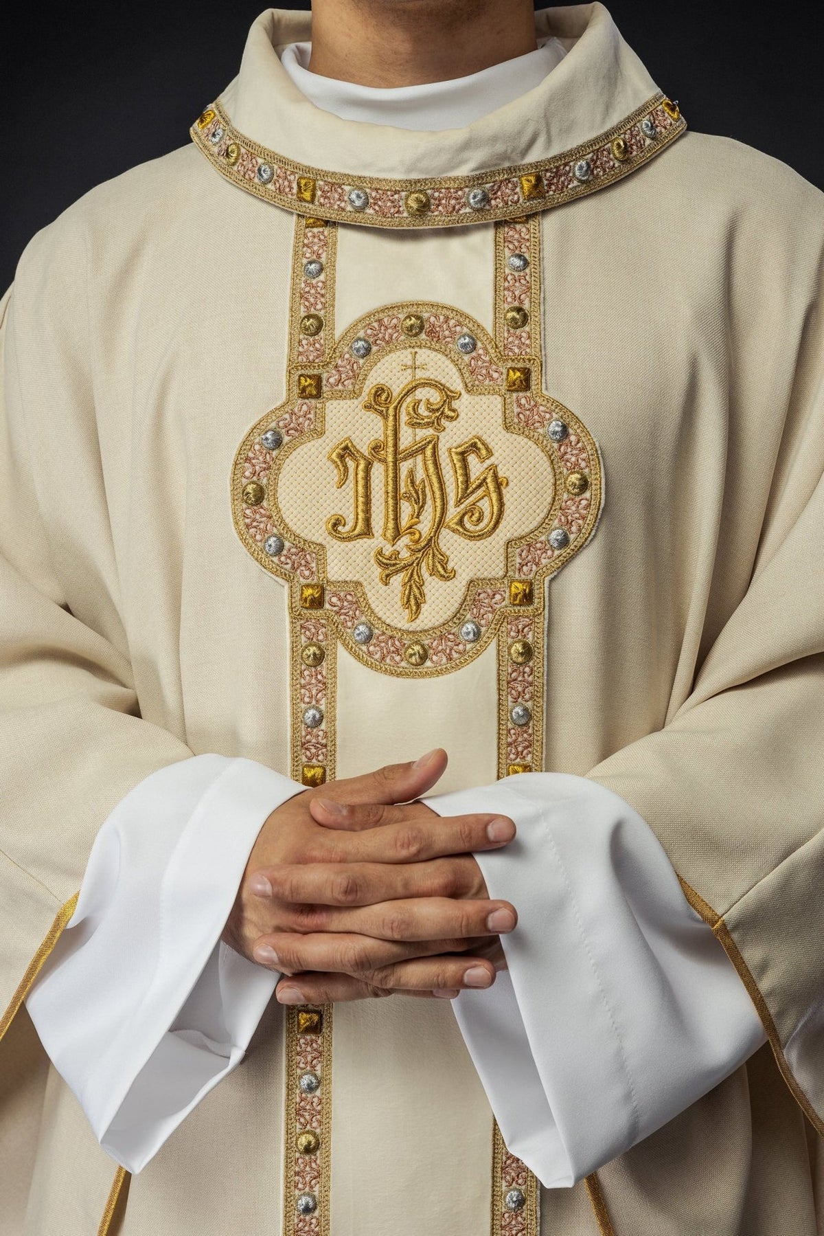 Ecru chasuble front close-up with IHS embroidery and ornate trim