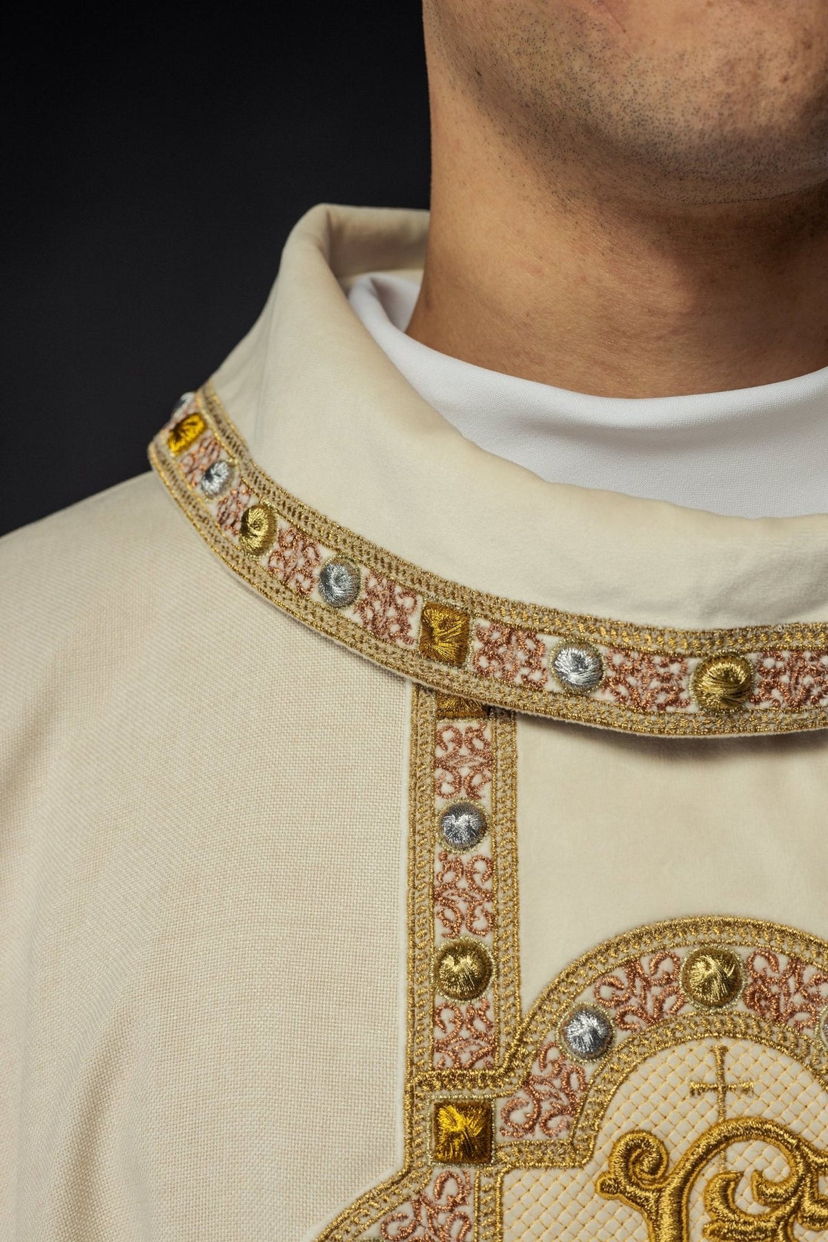 Ecru chasuble close-up of embroidered collar trim and orphrey