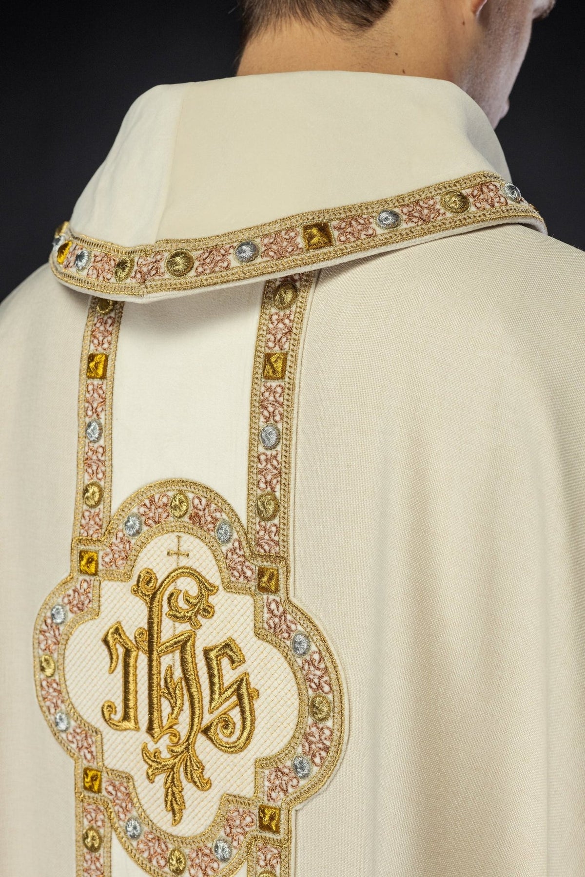 Ecru chasuble back close-up with embroidered collar and IHS orphrey