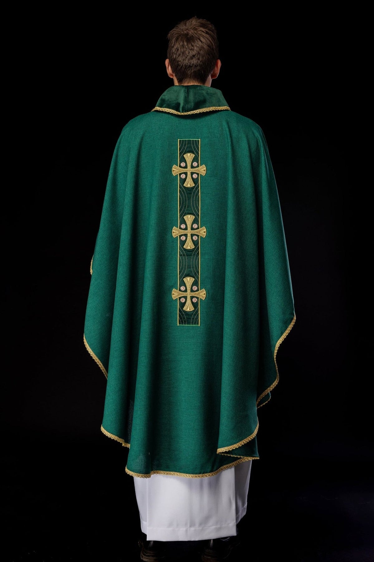 Green chasuble back close-up with gold collar trim