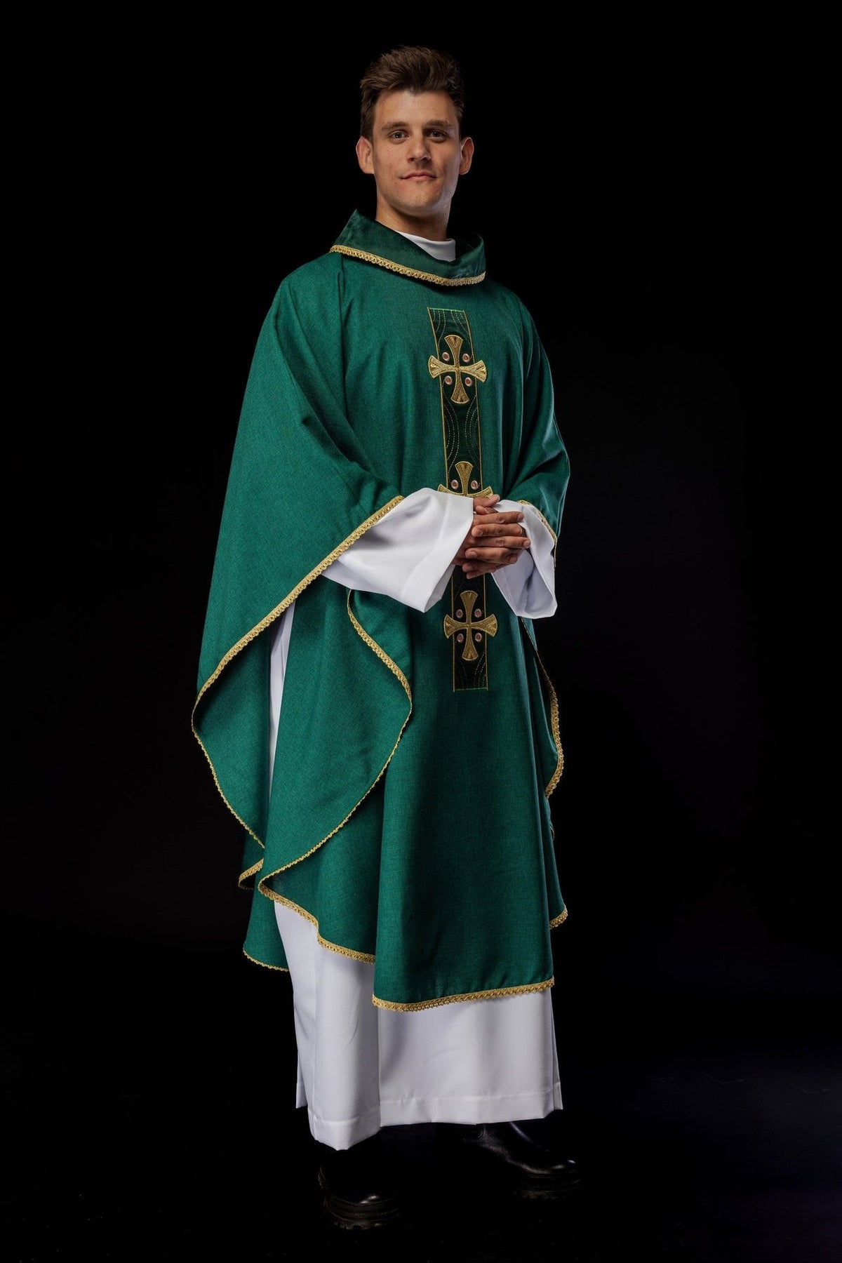 Green chasuble angled front view with gold embroidered crosses and trim