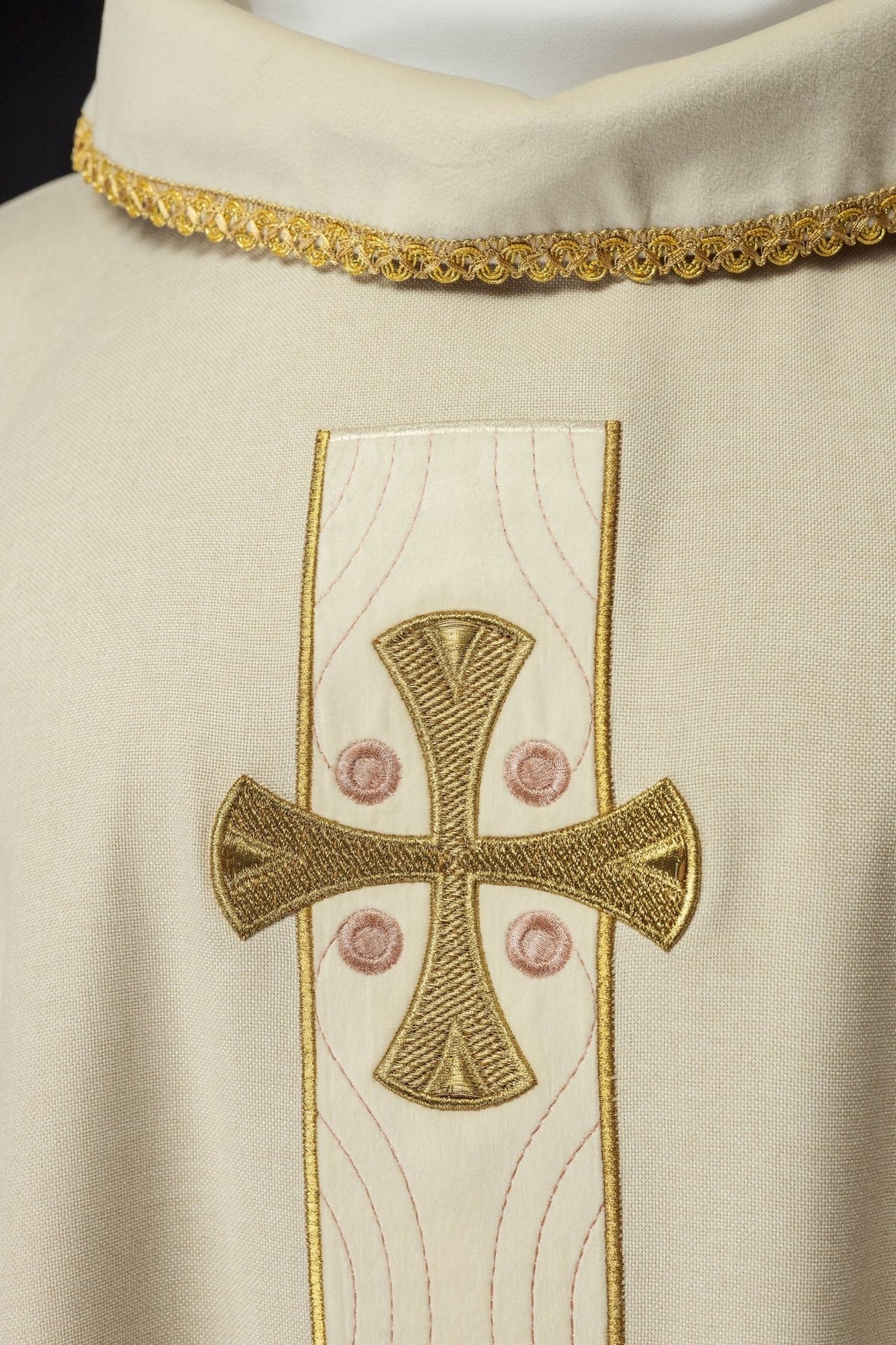 Ecru chasuble front close-up showing one embroidered gold cross