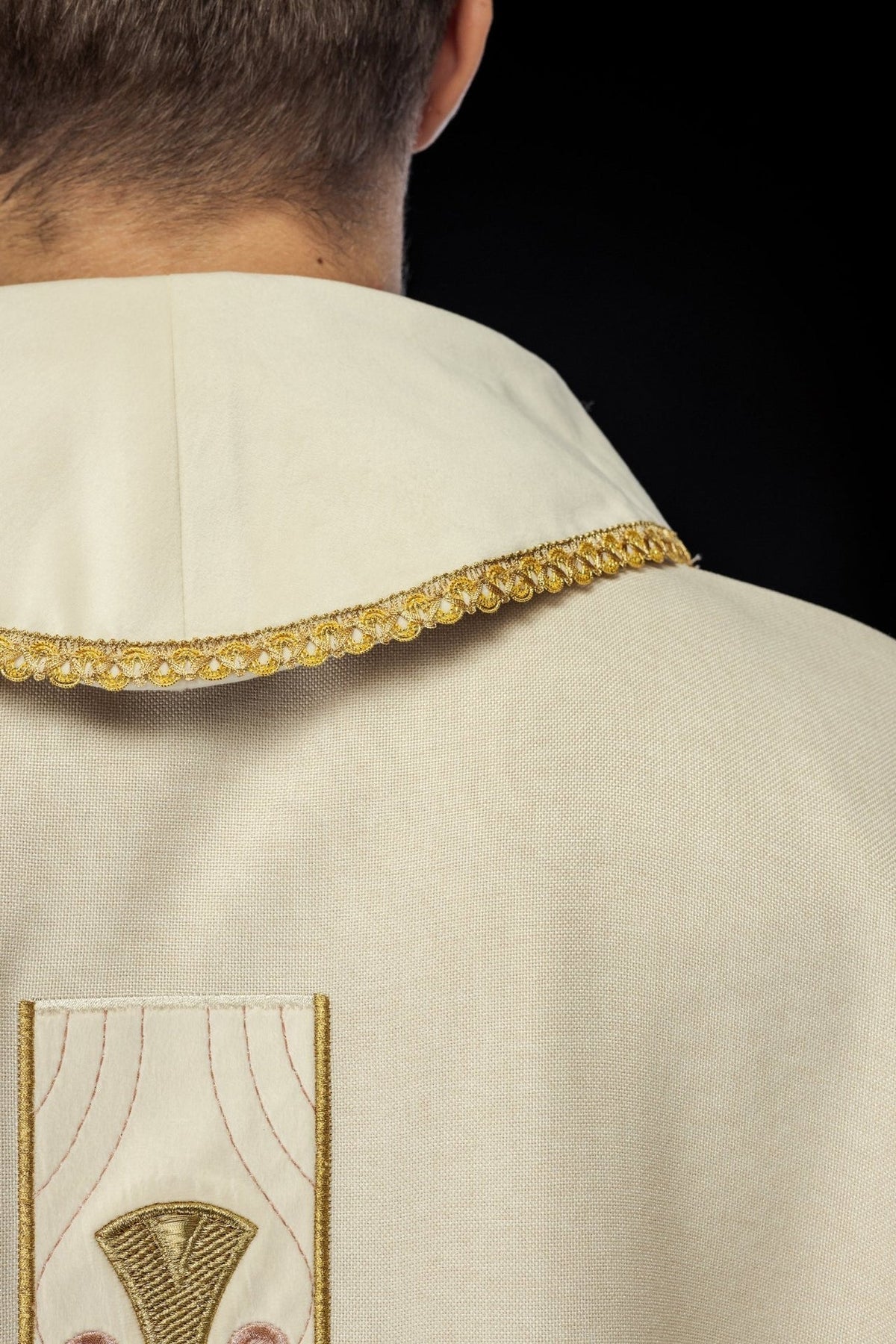 Ecru chasuble back collar and gold trim close-up