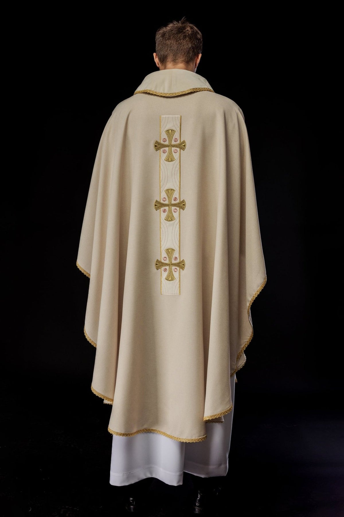 Ecru chasuble back view with embroidered gold crosses